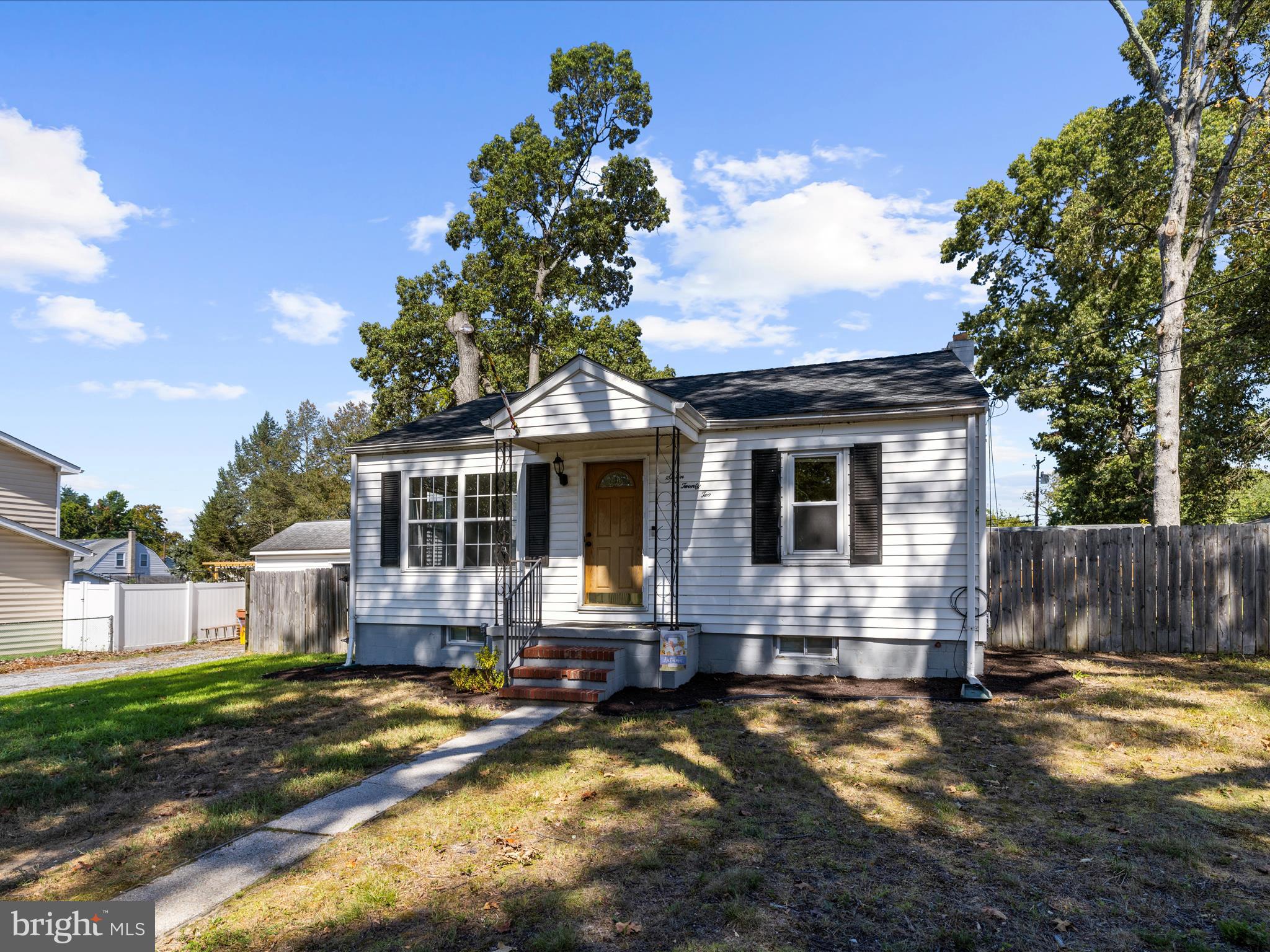 **STOP RENTING & PAYING THE LANDLORD'S MORTGAGE!!** Move right into this Cozy 3 BR Single Family Home that is Available Immediately. AND The Seller will give you $5,000 to be used towards Closing Help, with a Full Price offer!
Improvements include: New Roof (2018), New Kitchen Cabinets & Countertops (2021), New Living Room Window, New LVP Flooring in Living Room and Bedroom #2 (2022), Hardwood Flooring in Primary Bedroom, New Hot Water Heater (2021),
This home offers two porches, one off the front door and another off the kitchen, leading outside to a Fully Fenced HUGE Backyard! Plenty of outside space to enjoy cookouts or a great place to add a Firepit. Once inside, the living area is open and inviting. The basement has a Family Room that was previously being used as a theater room and a private Third Bedroom shares this Finished Lower Level space. Ample storage with laundry area (washer/dryer included) is on the other half of the lower level, with an outside exit to the side yard. Bring Your Toys as there is plenty room in the driveway for recreational vehicles, boats and/or a motor home. The 16x12' shed with vinyl siding matching the house, is great for additional storage. What a Value! The Seller has moved on and the house is being Sold AS-IS, however, Inspections are Welcomed at this very cared for home. NO HOA/NO Front Foot Fees! Did I mention this community is Water Oriented?!? Green Haven Wharf offers an 100 ft pier to relax by Stoney Creek. This, along with ballfields and a park, are all managed by the County for residents use. Pasadena Schools, too!!