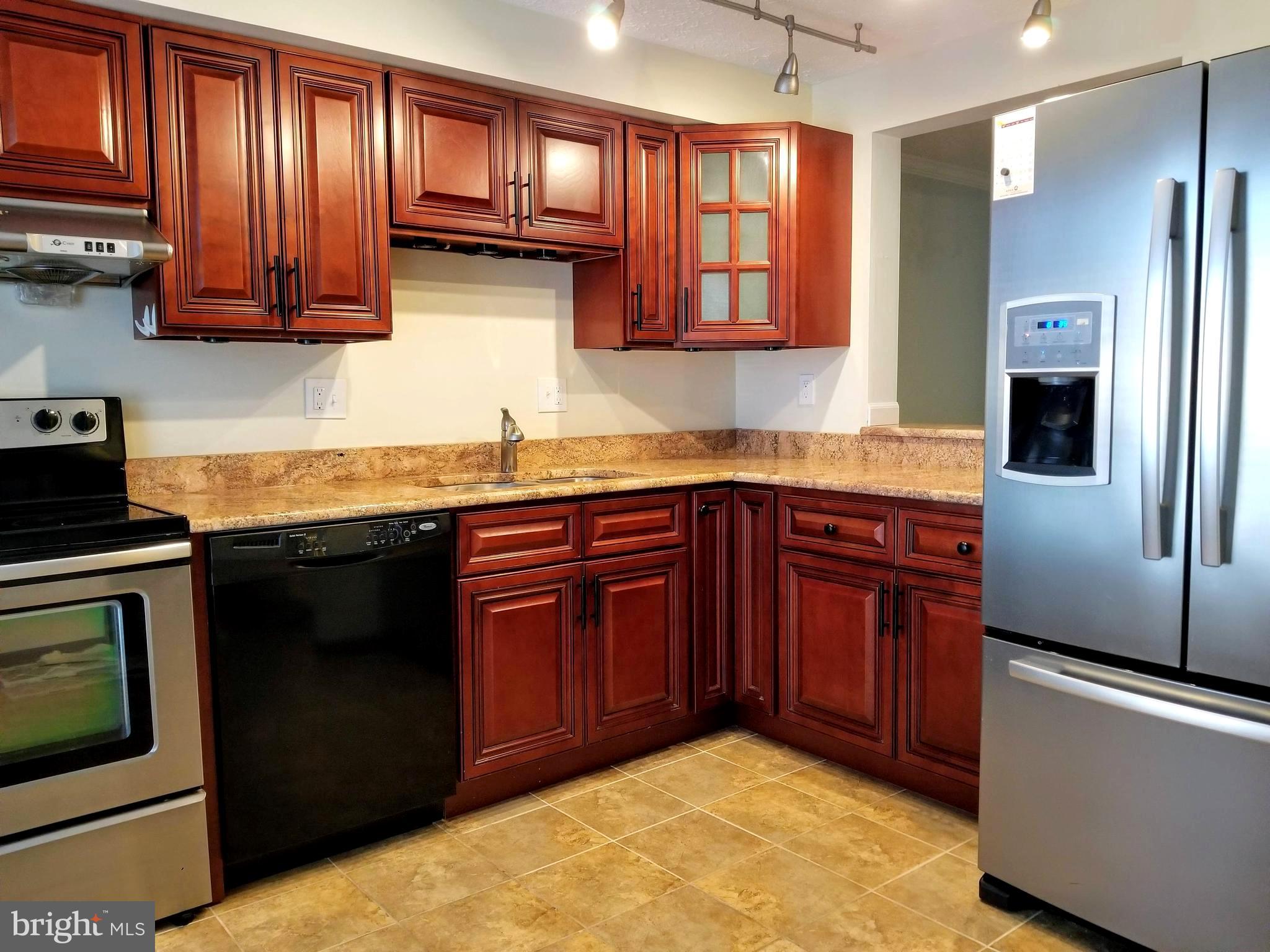 OPEN HOUSE Thu, Nov 21 5:00 - 7:00 PM | Imagine the convenience of being a mile away from the Shady Grove Metro while living in a neighborhood with playgrounds, fields, and courts! Never worry about parking with two assigned parking spots and plenty of street parking. Gas-cooking kitchen has been updated with SS appliances, genuine granite countertops, tile flooring, and rail lighting (if the oversized, French-door fridge isn't enough, there's a 2nd fridge in the basement). Enjoy the easy-cleaning of the beautiful bamboo flooring on the main floor. All three floors have updated bathrooms for your convenience. Basement has a large finished room that can be used as a guest room, office, or den space. There's a huge, clean, unfinished area that provides a huge amount of extra storage. Bedrooms all have custom built-in shelving making organizing a breeze. Friendly, local landlords & easy to apply online. Apply today, and move-in before the holidays!