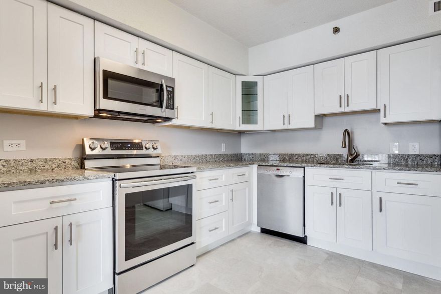 This bright and sunlit residence is bathed in natural light throughout the year. Enjoy 'J&K' kitchen cabinetry with contemporary brushed hardware, granite countertops, stainless steel kitchen appliances, and a deep sink with a modern faucet. You'll love the wood flooring throughout and the 6-panel bifold doors. The bathtub with shower faucets will be replaced before the new tenant moves in. A brand new AC unit in the utility closet on the balcony will help reduce your monthly electricity bill.

The building offers an array of amenities, including a pool, exercise rooms, saunas, steam rooms, billiards, a party room, 24-hour security, front desk service, and garage parking. Its prime location places you just minutes away from Shirlington, Pentagon City, Amazon HQ2, the new West Alex development, Ballston Quarter, Old Town, downtown DC, and major transportation routes such as 395, 495, and Ronald Reagan National Airport.

Nestled in the heart of Northern Virginia, this residence provides a convenient and tranquil lifestyle. Skyline, conceived by developer Charles E. Smith in the early 1970s, is located in the historic Bailey's Crossroads area of Falls Church. Here, you'll find everything you need for dining, shopping, working, playing, and living—all within a short stroll from your doorstep. Enjoy an effortless commute to DC, the Pentagon, and all corners of Northern Virginia. Welcome to a world of luxury, location, and carefree living!