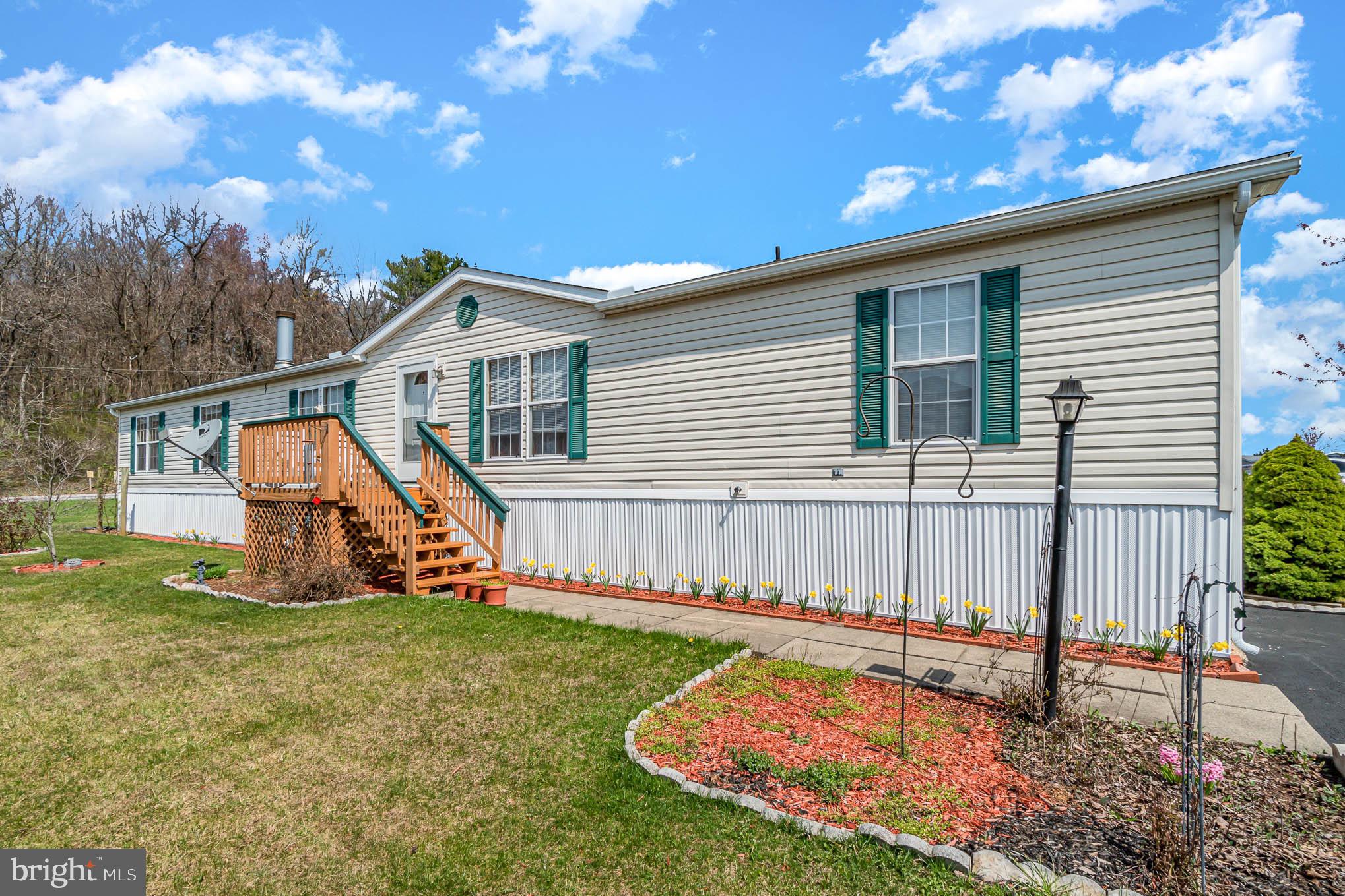 Come and see this spacious 2,052 square foot manufactured home in the Eagle View Community! It has 4 bedrooms and 2 full baths with a bonus sitting room off the master bedroom. A wonderful floorpan with the master wing located privately away from the guest bedrooms located on opposite end. There is plenty of space for entertaining with 2 large living rooms! Tons of storage throughout the home. There is a large deck off the kitchen for your outdoor entertaining needs. 8x14 shed included. Schedule your showing today!