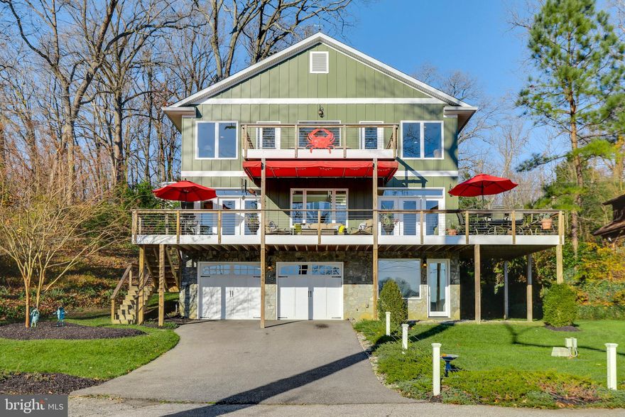 Situated in a quiet enclave overlooking Little Round Bay and St. Helenas Island, this custom coastal water view home is a turn-key gem. The light filled, open-concept design features a gourmet kitchen with honed granite countertops and stainless appliances, 3 inch solid white oak hardwood flooring throughout the main level, premium Jeldwen windows and doors with maintenance free casements, stainless cable railings on all stairways, main level bedroom with en-suite bath, nearly 700sf of outdoor sundeck space for entertaining with gorgeous water views in all directions, and a 2.5 car garage with tons of built in storage.  The nearby pier, currently in use by the owner, features one slip with deep water and room to accommodate a 45ft powerboat and second slip with a 10,000lb boat lift.   Conveniently located in Herald Harbor just minutes from downtown Annapolis, I-97 and route 50. Enjoy a scenic 20 minute boat ride to Annapolis City Dock and all the shops and restaurants! This beautiful home is a must see and priced to sell!   Herald Harbor features several community beach areas, a boat launch, hiking trails, community center, day care facility, fire department, convenience store, and restaurant.   Watch the VIDEO VIRTUAL TOUR here: https://my.matterport.com/show/?m=o8ka2YSqXs2   For community information and history please visit: https://www.heraldharborcommunity.com/history   See documents for a full list of features.