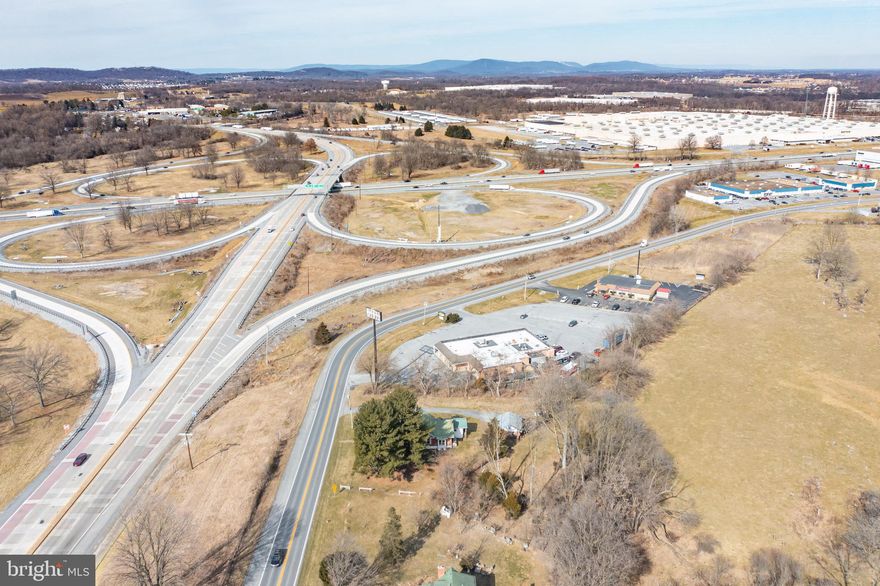 REDUCED…LOCATION......LOCATION......LOCATION...just off I-81, Exit 16.  GREAT VISIBILITY.  This property is being sold for future commercial development. There is a house that needs to be torn down, plus a garage in the back. Black substance on kitchen ceiling.
The land is visible from I-81 and Edwin Miller Blvd.  It has public water and a septic exists and 147.10' of road frontage.   Public water; public sewer is available. 
SELLING ‘AS-IS’, WHERE IS.  Square ft. of building is estimated.
ENTER HOUSE AT YOUR OWN RISK.  EXERCISE EXTREME CAUTION.