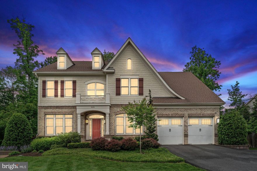 Welcome to this exquisite Craftsman style residence with 5 bedrooms, 4.5 baths and 5,204 finished square feet across three levels  on a 0.36 acre lot! This home is where timeless charm meets modern luxury in one of Northern Virginia’s most desirable communities and on a quiet cul-de-sac. The main level showcases gleaming hardwood floors, 10 foot ceilings, detailed trim work, a formal dining room, a refined living room, and a sun drenched family room. At the heart of the home, the gourmet kitchen is a chef’s dream featuring custom white cabinetry, granite countertops, stainless steel appliances from GE Monogram and Bosch, double ovens, a spacious island, walk in pantry, Miele built in coffee machine, and a well appointed butler’s pantry. Also on this level are a private home office, mudroom with built in storage, and convenient half bath. Upstairs, the expansive primary suite offers a peaceful retreat with a tray ceiling, private sitting area, and dual walk in closets. The luxurious marble bathroom includes a soaking tub, frameless glass shower, and dual vanities. Additional bedrooms include en-suite or Jack and Jill access to full baths. The walk out lower level is an entertainer’s paradise complete with custom bar with wood accents, stone accented recreation room with fireplace, dedicated home gym, custom home theater, additional bedroom, and full bath. Step outside to your private backyard sanctuary featuring flagstone patio, English garden with gazebo, built-in fire pit, grill station, and mature landscaping. This home also features a two car garage with one space pre-wired for electric car charging and a third space for parking on the driveway. Home automation system in place and can be serviced through ADT which allows for remote security monitoring. Ideally located just minutes from downtown Vienna, the W&OD Trail, Tysons Corner, Metro access, and major commuter routes. Westbriar/Kilmer/Marshall pyramid.