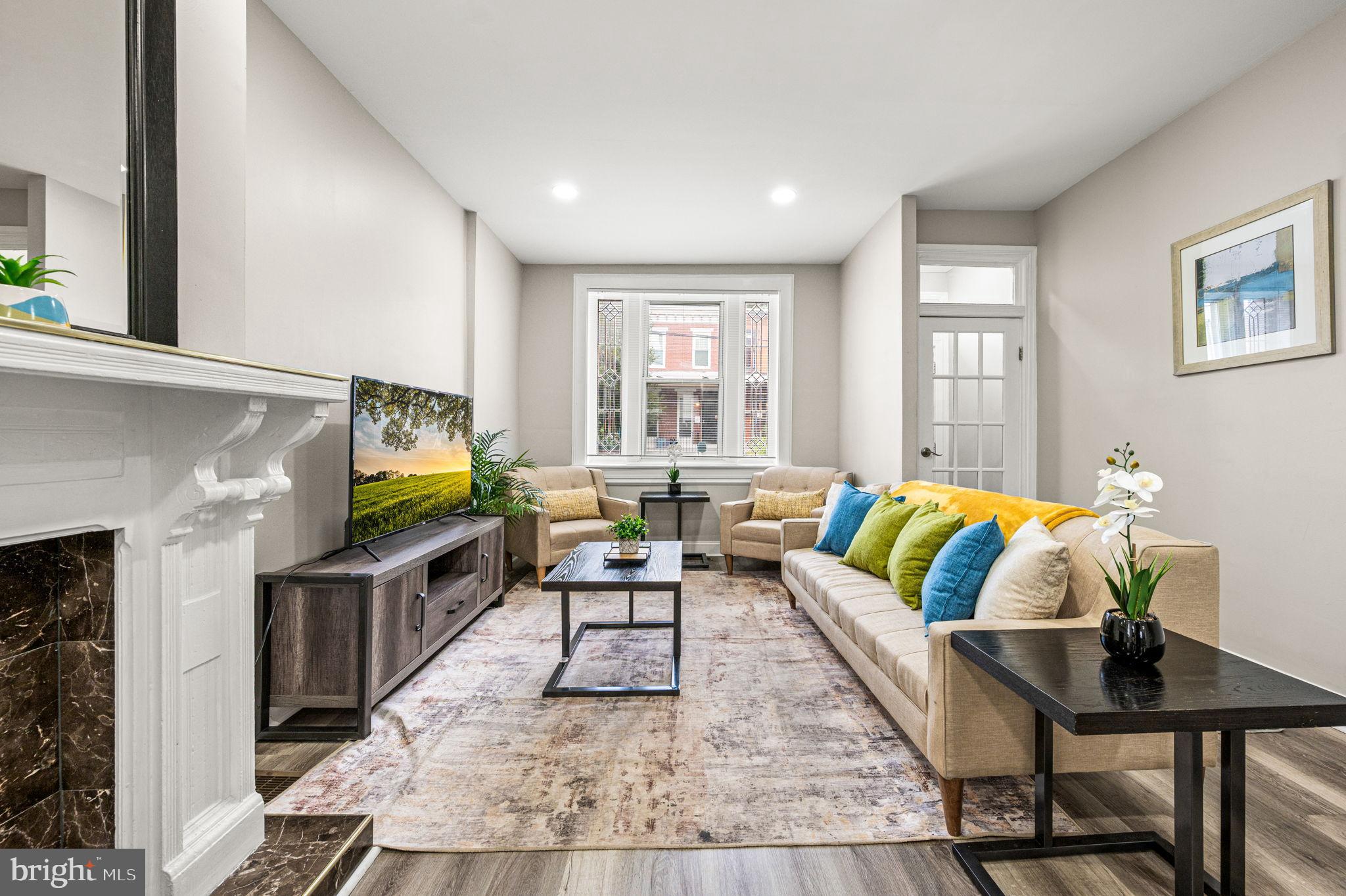 Discover the epitome of modern living in this fully renovated corner property located in the coveted Art Museum/Fairmount area. This exquisite home boasts a luxurious master suite featuring a private ensuite bathroom for your ultimate comfort. Two additional generously sized bedrooms offer ample space for relaxation and creativity. The modern open floor plan seamlessly blends living spaces, perfect for contemporary lifestyles, complete with a stylish island and range hood, central AC, and washer/dryer. The huge private backyard is an ideal setting for outdoor entertainment, offering a perfect retreat in the heart of the city. Enjoy enhanced privacy and a more spacious lot with this prime corner property, providing a unique advantage in this vibrant neighborhood. Located within walking distance to the vibrant shops of Brewerytown and the cultural treasures of the Art Museum, this home offers the perfect blend of historic charm and modern luxury. You'll be less than a mile from Whole Foods, Kelly Drive, and the trails of Fairmount Park. Embrace the lively neighborhood, with everything you need just a short stroll away.