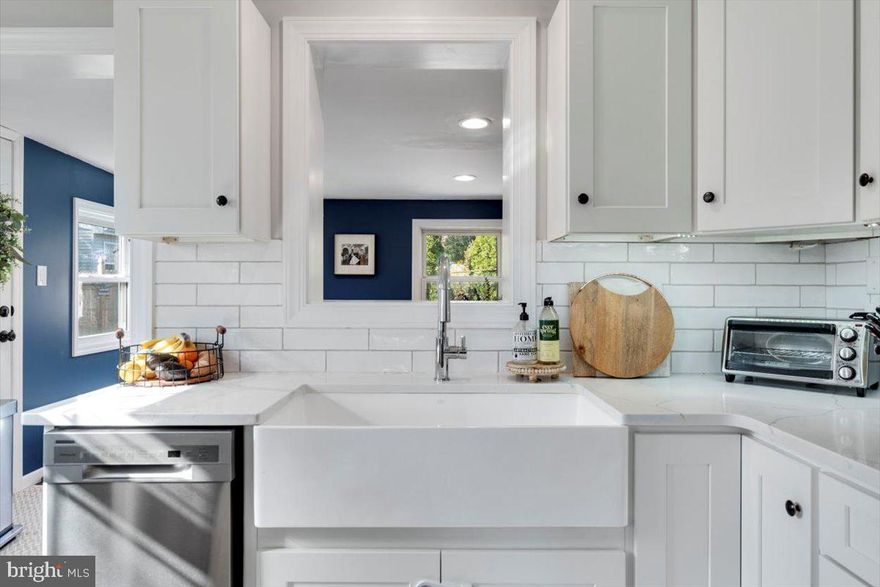 Pack your bag and move right into this rarely offered brick Colonial-Split in the Andorra Section of Philadelphia. Enter into the large living room with a sun-filled bay window. The main level also features a brand new eat-in kitchen with marble counters, tile backsplash, modern cabinets, farmhouse sink, and stainless steel appliances with gas cooking and a dishwasher. There is an addition next to the kitchen that  is currently used as a dining room. Exit from the rear into the extra large yard with a paver patio. The lower level offers additional living space currently used as a family room plus a separate storage area with laundry.  You'll find three spacious bedrooms, a modern tiled bathroom, and an attic in the upper levels. Plenty of closet and storage space. Additional upgrades include replacement windows and 200 amp electric. Stay cool this summer in the central air. Highly desirable location nearby public transportation, shopping, Valley Green, and easy access to major highways. Seven minutes to Manayunk and twenty minutes to Center City. Short Drive to Plymouth Meeting, Conshohocken, and King of Prussia. Easy to show! Schedule today!