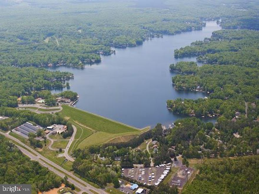 Excellent building lot for that new home you always wanted!  Enjoy the serenity of Confederate Dr. Quick minutes from the back gate. 79 Feet road frontage. The lot is gently sloping towards the back - perfect for a home with a walkout basement. Bring your builder to walk the lot, or we can recommend a builder.  Local builders are available.  Please contact the agent for details.  Plat is available.  See our amenities-filled community of 4000 homes where you can enjoy boating, jet-skiing, beaches,   500+ acre and 35-acre lakes, 18 hole PGA golf course, Clubhouse, Pool, Gym, Tennis courts, Horse riding, 24/7 security, and so much more.  Very close to Historical Fredericksburg and Civil War battlefields, 60- mi from Washington DC and Richmond. Close to Charlottesville and Culpeper.  Check out the community website  www. LOWA.org  for more community information.