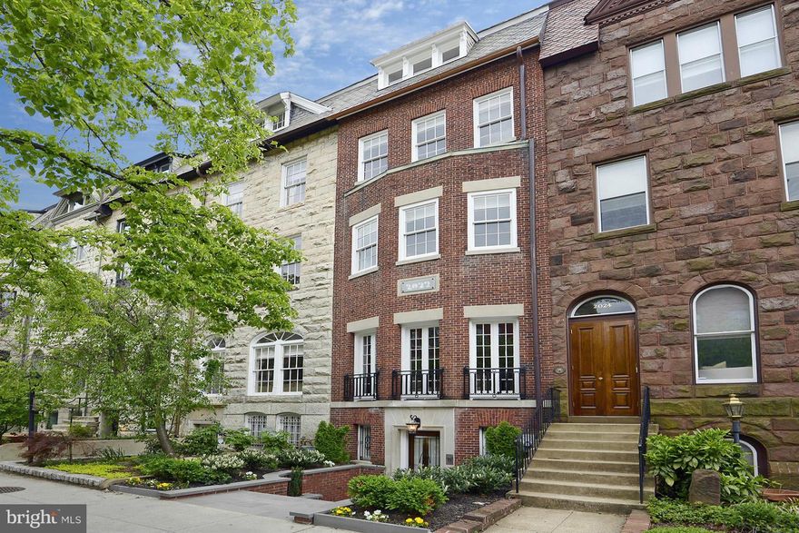 Like new!  This one of a kind townhouse features a main living area that spreads across two townhomes (33 ft. wide)!  Grand entertaining spaces, exceptional gourmet kitchen, hardwood floors throughout, grand foyer, 3rd floor master suite w/ extraordinary master bath & private terrace, 3rd floor w/ loft space, 4 BR, 4.5 BA, 2 FP, 4 outdoor spaces including roof top deck, & 2-Car off-street parking!