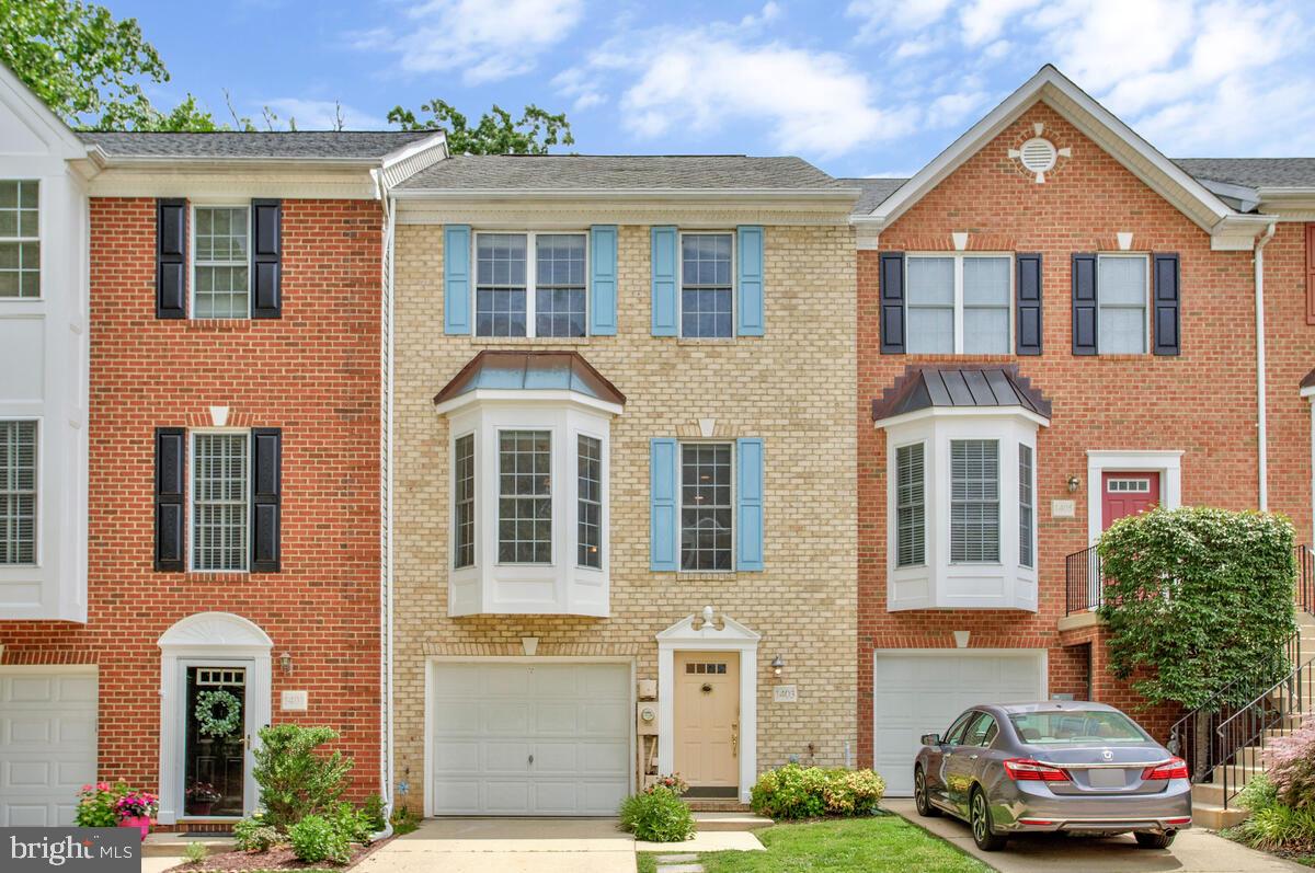 Welcome to this spacious 3-bedroom, 2 full & 2 half-bath 3-story townhome in the sought-after Falcon Crest community. Boasting a classic brick front and thoughtfully designed three-level layout, this home offers comfort, style, and a serene setting. The main level features striking tile flooring, laundry, half bath, and walk out to a brick patio. The large, open kitchen is perfect for entertaining, with ample counter space and cabinetry. Enjoy meals in the bright dining area, highlighted by a charming bow window that floods the space with natural light. Step into the inviting living room, complete with a cozy gas fireplace and access to the private deck overlooking a peaceful wooded backdrop—ideal for morning coffee or evening relaxation. Upstairs, the vaulted-ceiling primary suite offers a tranquil retreat with its own private bath. Two additional bedrooms with vaulted ceilings and another full bath provide plenty of space for family, guests, or a home office. Additional features include beautiful wood inlay floors and a one-car front entry garage with indoor access. Don’t miss this opportunity to own a well-appointed townhome in a quiet, wooded setting—walkable to restaurants and shopping!