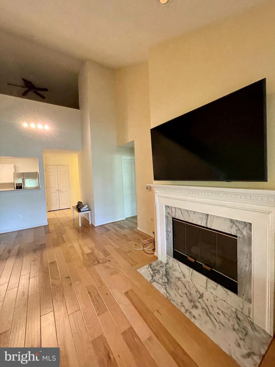 Available now. Beautiful top floor condo at the heart of Reston Town Center, Spacious floor plan with vaulted ceilings and amazing loft. Hardwood floor on the main level. Large walk-in closet in the bedroom, generous balcony with tons of storage. Updated kitchen with granite countertops and stainless steel appliances. Living room with gas fireplace. Beautiful updated full bathroom. Easy walk to restaurants and shops in Reston Town Center, Great access to the W&OD trail. Easy access to Silver Line Metro stop and Dulles Airport and grocery stores. 
Ample parking just outside the building. Community amenities include a clubhouse, picnic area, fitness center, meeting room &swimming pool.