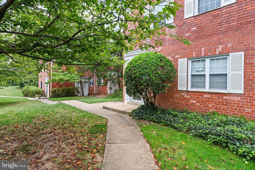Assumable loan at 5.75%; motivated seller! This upper level (no footsteps overhead!) Colonial townhouse condo offers the classic character and charm of Arlington/Old Town 20th century ('they don't make them like this any more!') with modern utility and efficiency. The open floor plan features original  parquet wood floor, newer windows, newer heat/cool appliances, added attic insulation (yes, your own attic with pull-down stairs!) and updated bath and kitchen features. The custom design kitchen cabinets, essential appliances in a newer gas range, newer refrigerator, new sink, new faucet, new disposer, and a countertop microwave, all make meal prep and food storage a dream in this 824 SF condo. Storage is well-planned in oversized coat and storage closets plus a converted storage space for the in-unit stacked washer/dryer for your private and leisurely use.  The amply sized bedroom comes with a good sized walk-in closet. The community enhances the urban location with park-like setting.  Parkfairfax is alive with pet friendly sidewalks with cleanup stations, community events all year long, 3 refreshing outdoor pools, a community center with party room accommodations, tennis courts, tot lots, and lovely winding trails over 132 wooded acres. This home sits at the corner metrobus stop, 395 access, 2.8 miles to Pentagon City Metro Station, 3.1 miles to VRE/AMTRAK King Street station, and just 3 miles to DCA by car. A safe walkway across 395 leads to the Shirlington neighborhood amenities giving you access to pharmacy, grocery, indoor dining, patio dining, boutique shops, and even a 'walking happy hour'.  The unit's condo fee includes gas (heat, cooking, water heater), water, and trash services along with community amenities of laundromat (for larger than the unit's appliances can manage), pools, tennis courts, community center,  fitness room, and walking paths. This is not just a residence--it's a gateway to vibrant and well-established social and convenience opportunities. Experience this delightful property and neighborhood today!
