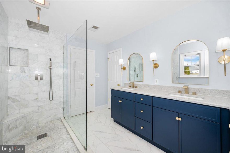 Wait until you see the kitchen and sun-filled morning room in this home.

Tucked on a quiet cul-de-sac, this impressive residence offers nearly 4,000 square feet of beautifully designed living space where natural light, open spaces, and standout finishes come together in a way that immediately feels different.

The heart of the home is the stunning kitchen, anchored by a massive center island, elegant Venezia quartz countertops, premium Kucht appliances, an under-counter microwave, and a stylish dry bar with a built-in wine and beverage refrigerator that flows perfectly into the main living space.

Just steps away, the dramatic morning room with soaring ceilings and arched windows fills the home with sunlight and creates an incredible setting for dining, relaxing, or gathering with friends and family. The adjoining family room with a gas fireplace adds warmth and comfort while maintaining the open feel that makes this home so inviting.

Upstairs, the primary bathroom delivers a true spa-like retreat, featuring an oversized Roman shower with a ceiling rainfall feature, elegant tilework, and a spacious dual vanity.

Additional highlights include a main-level home office, a finished lower level offering flexible recreation space, and an expansive stamped concrete patio ideal for outdoor entertaining.

Located just minutes from I-70, shopping, dining, and the Hagerstown Premium Outlets, the home offers the perfect balance of convenience and peaceful cul-de-sac living.

Homes with this level of light, space, and design rarely come available — and once you step inside, you’ll understand why.