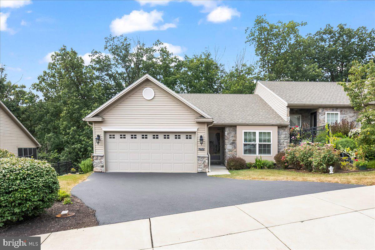 Welcome home to 258 Red Haven Road, a beautifully maintained former model home in the desirable community of Olde Orchard Hill. Built in 2018, this bright and spacious 2-bedroom, 2-bath end unit offers effortless one-floor living with thoughtful upgrades throughout.
Step inside to an open-concept layout enhanced by high ceilings, large windows, and remote-controlled skylights that fill the space with natural light. The well-appointed kitchen boasts granite countertops, abundant storage, and a seamless flow into the dining area and living space featuring a cozy corner fireplace. Just off the main level, a large Trex-style deck invites you to relax and enjoy the outdoors.
The primary suite is a peaceful retreat with double sinks, a walk-in shower, and generous closet space. On the opposite side of the home, a guest suite will provide comfort and privacy.
A 2-car garage provides convenience and extra storage. Downstairs, a full walk-out basement offers endless possibilities for additional living space, a home gym, workshop, or storage—and opens to an oversized patio, perfect for outdoor gatherings. Additional updates include a sprinkler system, security system, ADA accessible features, and gutter guards.
With a low monthly HOA covering exterior lawn maintenance and snow removal, this home makes living easy—giving you more time to enjoy what matters most.
Whether you're downsizing or seeking a low-maintenance lifestyle in a well-cared-for community, 258 Red Haven Road is ready to welcome you. Schedule your private tour today!