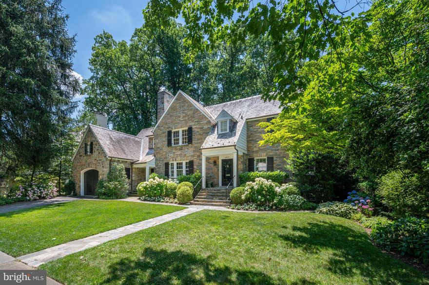 NEW LISTING!! Rarely will you find a more carefully considered and timeless renovation that upholds the traditional fieldstone facade and fully enhances comfortable family living in today’s world. The expansive main level offers many opportunities to gather together and celebrate or curl up with a good book. The open floor plan includes the universally desired Chef’s Kitchen, Family Room and Breakfast rooms. The indoor/outdoor relationship here is fully emphasized with various accesses to the large, level and private back yard. Daily life is greatly enhanced by the garage entrance to residence via and covered side porch and elegant hallway with practical and enviable Mudroom. The Primary Suite is quite serene with its own entry hall and includes a cathedral ceiling, sumptuous Bath and closet cleverly situated to enable one early riser not to disturb their favorite sleeper. The expansive Lower Level includes many useful spaces for relaxing, working, working out, creating and being a well-attended guest! Multiple work spaces, three fireplaces, generous hallways and pristine condition afford the new fortunate owner all of the elegant features that cannot be easily replicated nor found all together in a singular property such as they are here.