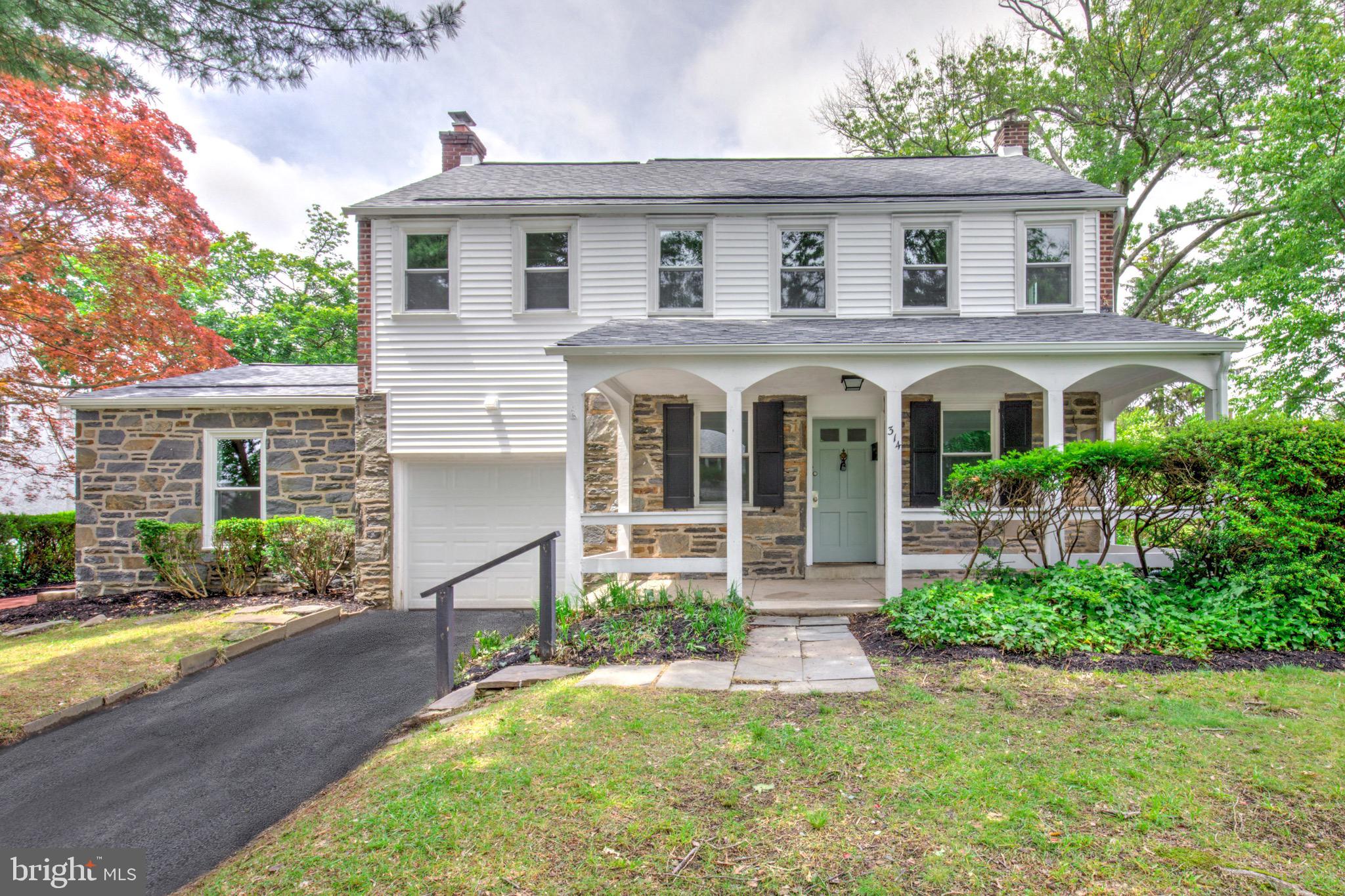 Welcome to 515 Devon Road — Nestled in a peaceful, established community, this charming 3 bedroom, 2.5 bathroom residence with attached one-car garage has been completely updated and offers the perfect balance of comfort and convenience. With easy access to nearby shopping, dining, schools, and commuter routes you can enjoy everything the greater Philadelphia area has to offer! This elegant home retains beautiful charm while offer a spacious layout with modern updates. A striking arched front porch, detailed stonework, and classic shutters create timeless curb appeal. Inside, the main level showcases gleaming hardwood floors and an open living and dining area that flows into a fully renovated, gourmet kitchen. With new cabinetry, quartz countertops, a tiled backsplash, and stainless steel appliances, this space is perfect for cooking and gathering alike. A full bathroom with a walk-in shower and a first-floor laundry area add everyday ease to the main level. A standout feature of the home is the cozy fireplace room with exposed beams and built-in shelving—offering warmth, character, and the perfect space to unwind. Upstairs, you'll find three generously sized bedrooms with more hardwood flooring and a fully updated bathroom with a tiled tub/shower combo. The finished lower level adds versatile space with plush carpeting—ideal for a home office, playroom, or media room—plus a half bath for convenience. Outside, enjoy a lovely brick patio surrounded by mature trees and shrubs, perfect for relaxing or entertaining. Additional updates include brand-new windows, a new electric heat pump for efficient heating and cooling, newly sealed driveway and a well-maintained roof for added peace of mind. This move-in-ready home combines charm, style, and functionality in a prime location. Schedule your showing today and see why 515 Devon Road is the perfect place to call home.