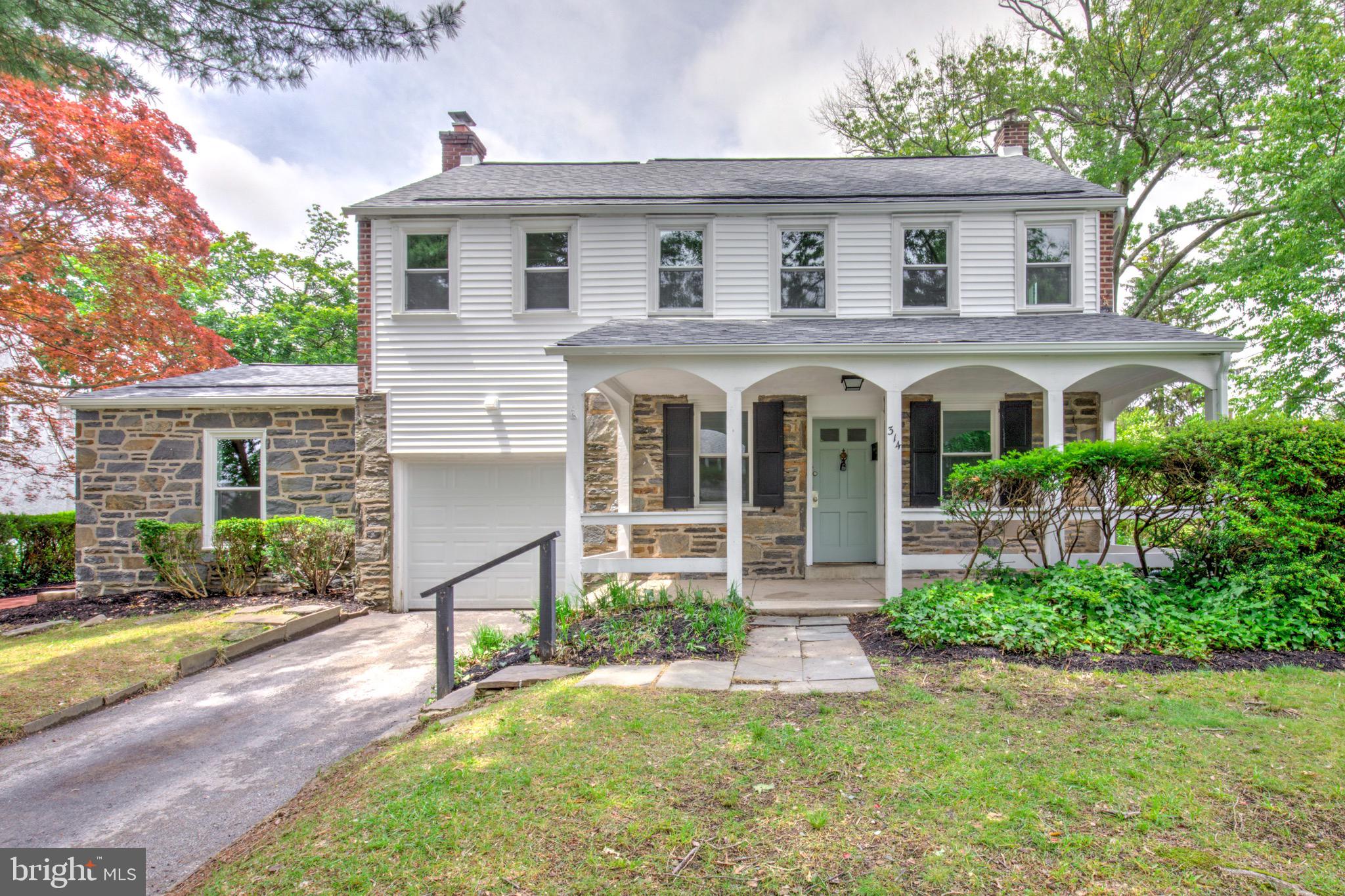 Welcome to 515 Devon Road — Nestled in a peaceful, established community, this charming 3 bedroom, 2.5 bathroom residence with attached one-car garage has been completely updated and offers the perfect balance of comfort and convenience. With easy access to nearby shopping, dining, schools, and commuter routes you can enjoy everything the greater Philadelphia area has to offer! This elegant home retains beautiful charm while offer a spacious layout with modern updates. A striking arched front porch, detailed stonework, and classic shutters create timeless curb appeal. Inside, the main level showcases gleaming hardwood floors and an open living and dining area that flows into a fully renovated, gourmet kitchen. With new cabinetry, quartz countertops, a tiled backsplash, and stainless steel appliances, this space is perfect for cooking and gathering alike. A full bathroom with a walk-in shower and a first-floor laundry area add everyday ease to the main level. A standout feature of the home is the cozy fireplace room with exposed beams and built-in shelving—offering warmth, character, and the perfect space to unwind. Upstairs, you'll find three generously sized bedrooms with more hardwood flooring and a fully updated bathroom with a tiled tub/shower combo. The finished lower level adds versatile space with plush carpeting—ideal for a home office, playroom, or media room—plus a half bath for convenience. Outside, enjoy a lovely brick patio surrounded by mature trees and shrubs, perfect for relaxing or entertaining. Additional updates include brand-new windows, a new electric heat pump for efficient heating and cooling, and a well-maintained roof for added peace of mind. This move-in-ready home combines charm, style, and functionality in a prime location. Schedule your showing today and see why 515 Devon Road is the perfect place to call home.