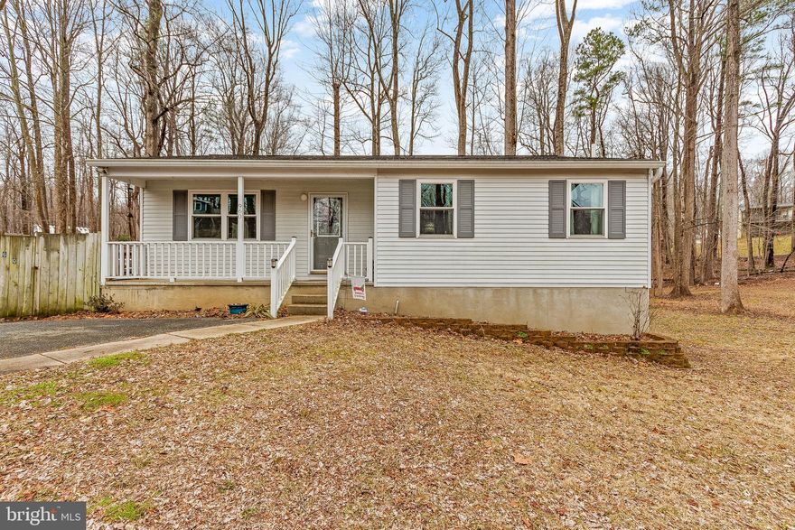 Priced to Sell! QUAINT 4 BED, 3 BATH RAMBLER in Huntingtown with a FULLY FINISHED BASEMENT! A spacious front yard and walk-up front porch greet you upon arrival to this home. Walkthrough the front door to an open concept great room with custom built-in entryway storage to your right. Entertain guests in your living room while cooking a delicious meal in the updated kitchen with stainless steel appliances! Natural light spills into the main living space from both the front and side yard window views. Large sliding glass doors take you out to the side deck and fenced-in side yard, perfect for barbecues and other outdoor activities. Head down the hallway to find the primary suite, 2 bedrooms and their shared bathroom. The Primary suite is a must-see with fresh paint and a lovely updated bathroom with a walk-in tile shower. Head downstairs to the updated finished basement for get-togethers and game nights. The large sliding glass doors also offer plenty of natural light to the space and lead to a wonderful flat back yard. The lower level bedroom is a perfect space for an office or guests, especially with the newly updated full bath close by. The basement is finished off with a laundry nook and unfinished room, perfect for storage or renovation opportunities! This home offers a spacious flat yard with not one, but two outdoor sheds for lawn or outdoor activity storage. Located in desirable huntingtown, this is definitely a home you won't want to miss!