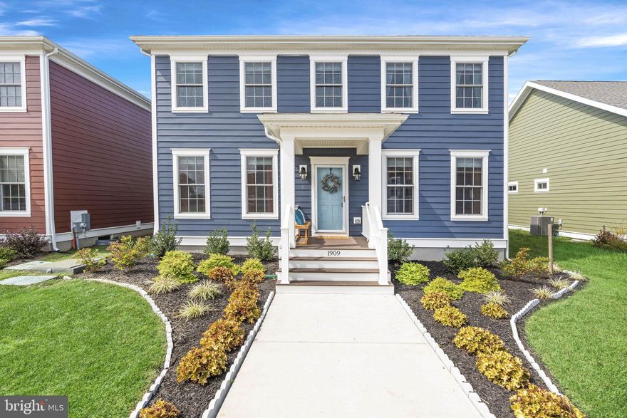 Welcome to 1909 Gladys Street in the highly sought-after Town of Whitehall! Whitehall is a community that offers fantastic amenities, quality craftsmanship, and a warm welcome. This home's wow factor is abundant, from the curb appeal outside to the model home vibes inside. You will notice the beautiful landscaping and striking deep blue hardi-plank siding as you approach the home. Get ready to decorate the charming front porch for every season! Upon entering the front door, you will be greeted with a large living room to your right and a den to your left, which can be used for various purposes. The foyer, bathrooms, and kitchen have hardwood flooring, which gives the home a warm and welcoming feel. Moving forward, you will pass a hall closet and powder room and enter the main living space with an open floor concept. The kitchen is equipped with a large island, stainless appliances, beautiful 42" white cabinetry, and granite countertops. The family room and dining room are just off the kitchen. This model features a first-floor primary bedroom with double closets and en-suite bathroom, which includes a double sink vanity and a stand-up shower with glass doors. The laundry room is also on the main level, with tile flooring and access to the backyard and the garage. The massive garage can easily accommodate two large vehicles and provide ample storage space (including overhead storage). Upstairs, (iron balusters on the staircase) you will find an extra large loft perfect for various purposes, three spacious bedrooms, and a full bathroom! The unfinished basement is a vast space with an egress window, providing endless customization possibilities. The backyard has a brand-new vinyl fence, and the light fixtures and ceiling fans were just installed throughout the home. 1909 Gladys St. has a tree-lined view in the backyard and is tucked away in the neighborhood for extra privacy. A couple of NEW updates include new carpet in the lower level and fresh paint in several rooms and bathrooms. This home is conveniently located near the recreation center, where you can enjoy various activities such as Zumba, yoga, and self-defense classes. Additionally, the chiropractor, Christiana Care, and Wellness Center are located on-site. Lorewood Grove Elementary is within walking distance, and many shops have just opened and are coming soon! Convenience is just outside your door.