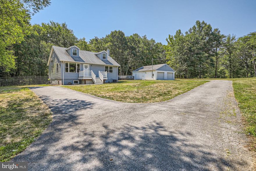 4-bedroom, 2-bathroom home sits on a generous 3.4-acre lot with 2 door garage. Nestled in a tranquil setting surrounded by mature trees, this secluded oasis offers the perfect blend of privacy and convenience. The quiet neighborhood and very private driveway provide a peaceful retreat, while the property's location ensures easy access to all main commuter routes, BWI, NSA, Fort Meade, and the MARC train.

Fully renovated in 2021, offering ample space and potential for expansion. The interior boasts modern updates throughout, including a stunning kitchen featuring elegant granite countertops. Step outside to discover a large deck, perfect for hosting gatherings or simply enjoying the serene surroundings.

The property includes a spacious 728 sq ft two-door garage with commercial electric and a new concrete floor, ideal for hobbyists or those needing extra storage. The expansive yard not only provides plenty of room for outdoor activities but also presents exciting possibilities for future development. Additionally, a partially finished basement awaits your personal touch, ready for completion or use as valuable storage space.

This unique property offers additional benefits that set it apart. Potentially assumable VA loan at an attractive 2.75% interest rate (subject to qualification), potentially saving the buyer thousands in interest over the life of the loan. Furthermore, the lot may have subdivision potential, offering an intriguing opportunity for the right buyer (interested parties should confirm details with the county).

Don't miss this chance to own a piece of privacy with incredible potential. Experience the perfect harmony of seclusion and accessibility that this property offers.