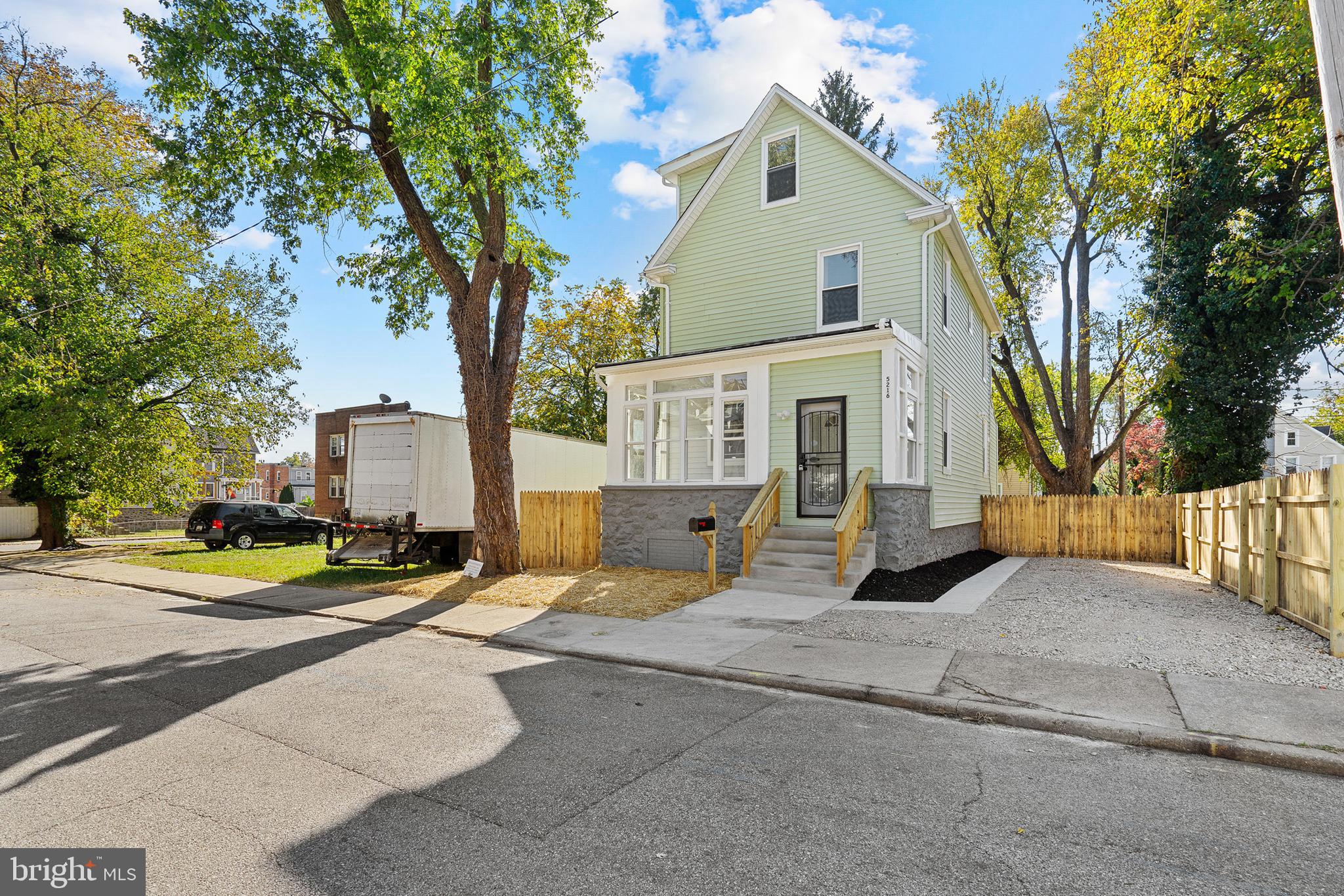 SELLER IS VERY MOTIVATED Welcome to this stunning, fully renovated single-family home located in The Arlington neighborhood of Baltimore City! Boasting four finished levels, this home features 6 spacious bedrooms, 4.5 baths, and an open floor plan perfect for modern living. The main level offers a beautifully updated kitchen with granite countertops, a kitchen peninsula, and stainless steel appliances, along with a dining room, bright living area, and a convenient half bath with a double sink. The second floor includes 3 bedrooms and 2 full baths, including a luxurious master suite with a custom tile shower. The third floor adds 2 more bedrooms and a full bath, while the fully finished basement provides a private bedroom, full bathroom, and walkout access. Outside, enjoy a cozy enclosed front porch, a fully fenced backyard, and a driveway for off-street parking. With new flooring, electrical, plumbing, HVAC, and a new roof, this move-in-ready home is a must-see. Schedule your showing today!