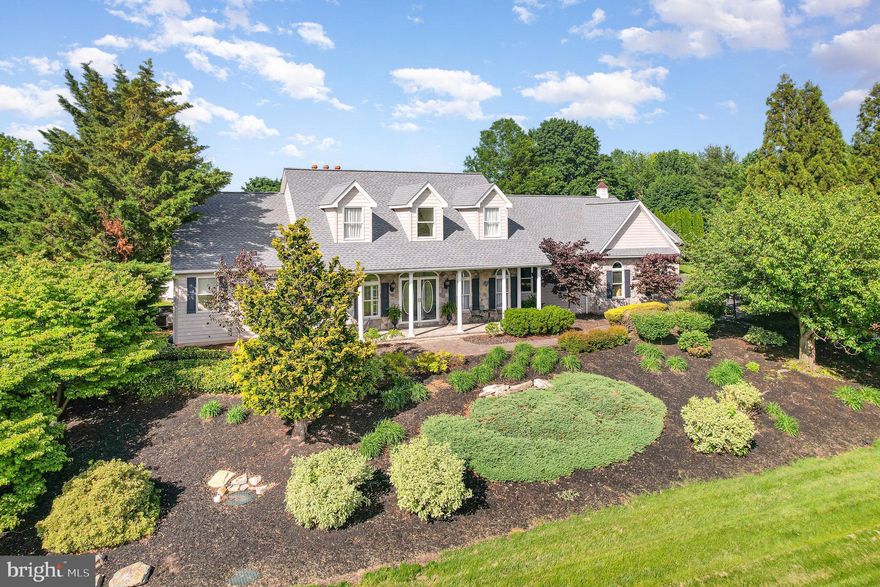 Discover this beautifully maintained Cape Cod offering over 5,400 square feet of finished living space. This thoughtfully updated home is situated on a landscaped 2.98 acre lot with an in-ground pool and panoramic views of the surrounding Lebanon Valley. This stunning home is comprised of a "primary residence" and one level "in-law suite" or "guest house" with private entrance. The PRIMARY RESIDENCE features an open family room with hardwood floors, updated kitchen with granite counters and custom cabinets and a breakfast nook with vaulted ceiling that opens to the rear patio and in-ground pool. The first floor with 9 foot ceilings includes an office with French doors, formal dining room with tray ceiling, large laundry area with numerous cabinets and sink, powder room and a spacious primary bedroom with a large walk-in closet, ceiling fan, hardwood floors and a stunning bath with Italian marble flooring, double vanity, jacuzzi tub and a large custom walk-in shower. The second level has 3 additional bedrooms with ceiling fans and walk-in closets and a full bath. The sprawling lower level includes a large great room with exercise area, powder room and unfished space ideal for a workshop or storage. The IN-LAW SUITE / GUEST HOUSE with private entrance features an eat-in kitchen, living room, laundry, bedroom and full bath. The fenced rear yard has a beautiful in-ground pool with a paver / concrete patio and outside changing room with shower and bath. The integral 3 car garage with openers has pull-down step to additional attic space and provides access to the primary residence and guest house. The detached carriage house has space for 2 additional vehicles and offers a large unfished 2nd level offering endless possibilities. Additional outdoor structures include 2 large storage sheds and a "She Shed" beside the outdoor gardens. Recent updates include NEW: Pool pump and timer 2025, Pool filter 2024, Roof 2023, Heating system on second floor and basement 2023 / guest house 2020 Central air units in 2023 and 2020 Primary bath 2023 Chimney waterproofing and crown 2023 Basement windows 2023 and 2nd floor bath 2022. This private retreat is only minutes from schools, shopping and other amenities.
