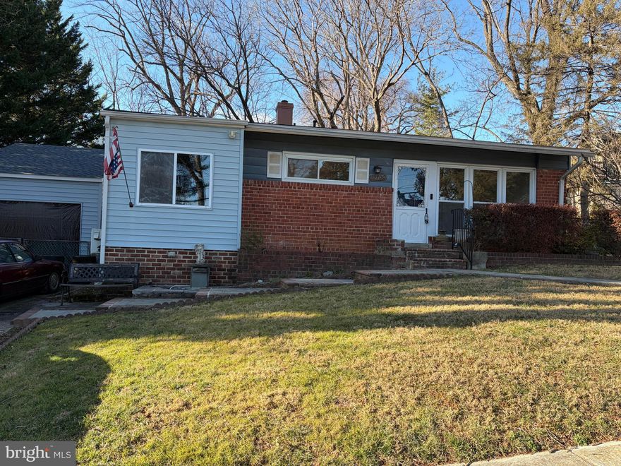 Great location!! MOVE IN READY 3 Bedrooms, 2 full baths and 1 car oversized detached garage split level located close to public transportation, schools, shopping centers, restaurants, places of worship and smooch more...Freshly painted, refinished hardwood floor on the main level, granite counter top and stainless steel appliances. Sun/Florida room with ceramic flooring and French door leading to the deck.  Outside,enjoy the flagstone sidewalk, oversized driveway, deck and a fenced in backyard with a brick BBQ