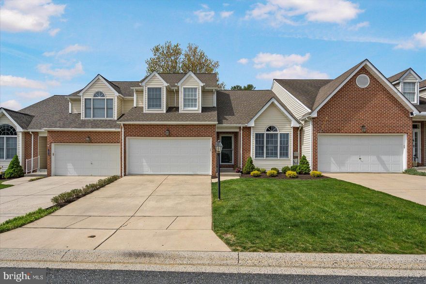 Welcome to the highly sought-after community of Barrington, where luxury and maintenance-free living combine.  This 2 car garage villa home has had recent updates that include an amazing eat-in kitchen, primary bathroom, additional basement bedroom, new roof, professional paint job, and all new flooring.    You will not be disappointed from the moment you walk into the large two story great room and dining room.   As you  head into the new kitchen (2023) you will notice an extremely thoughtful use of space and a kitchen that has everything you will need.  The eat-in kitchen area with barrell vault ceiling is large enough to host your next gathering.  Also conveniently located on the main level is a spacious primary suite that includes a walk in closet and newly renovated bathroom (2024).  The laundry room is also conveniently located on the main floor just inside the large two car garage.  Head upstairs to two enourmous bedrooms and a loft area that has many potential uses, whether a sitting area, office/study or gaming room.   Head downstairs to a completely finished basement area with another full bathroom, family room area with a bar, a 4th bedroom and another option for an office space or workout room.    This Barrington beauty will not disappoint.