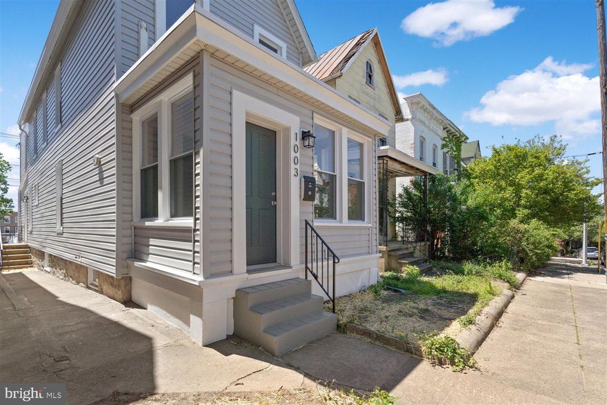 Soak in the natural light in this rare detached single family home on a quiet tree lined street in the center of Hampden. Just steps away from the Avenue, this brand new renovation features 3 beds and 2.5 baths with an open concept layout. Enjoy cooking in the gourmet kitchen with quartz countertops, SS appliances. and a large walk in pantry. Hardwood flooring,  classic tile and exquisite finishes throughout the home.  Rear deck with back yard space and additional parking spot. Main level washer/dryer, . Plenty of storage in the waterproofed basement.