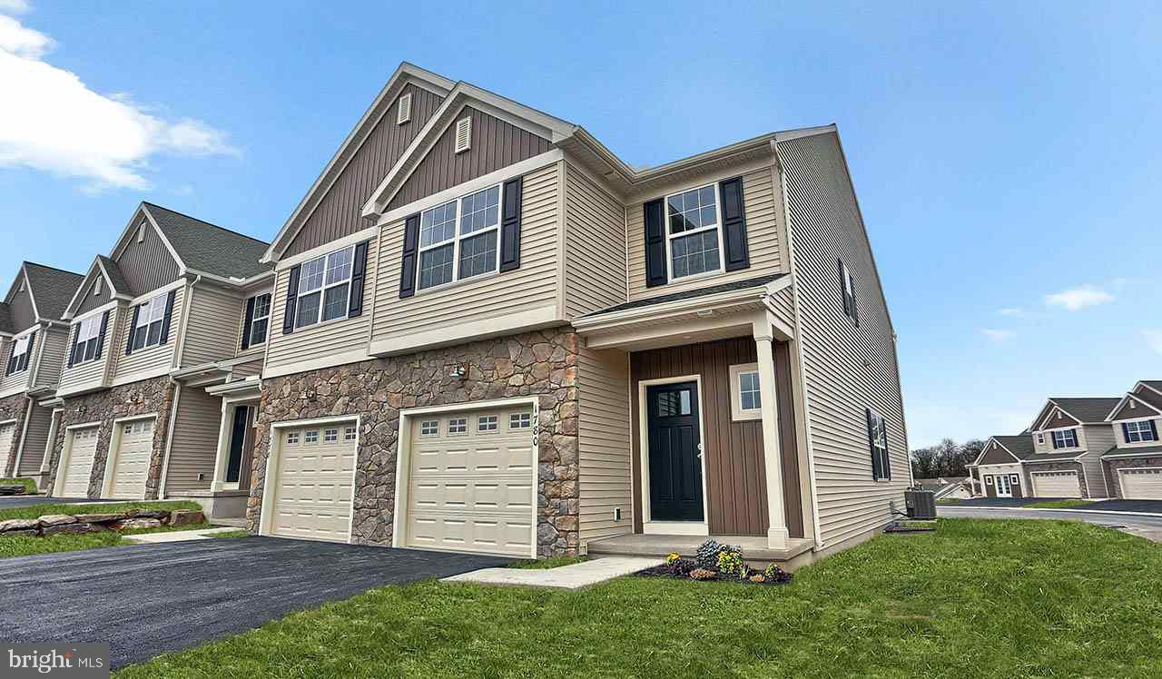 AVAILABLE NOW! This roomy, two-story townhome features an over sized one-car garage, welcoming front porch, and a spacious floor plan. On the first floor, you are welcomed by hardwood flooring in the Foyer and Powder Room. An open concept Kitchen/Dining Area and Family Room allows for a relaxed, open space feel that?s great for entertainment. On the second floor, the large Owner?s Suite includes a private bathroom with 5' shower and large closet. The second floor also has a convenient laundry area.