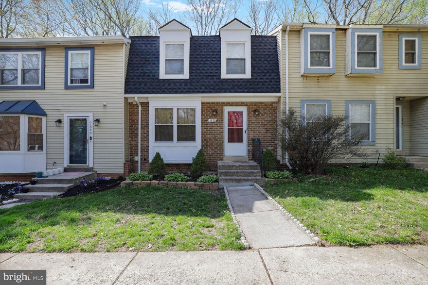 Welcome to this sun-filled brick-front townhome featuring 3 spacious bedrooms, 3 full baths, and 1 half bath in the peaceful and private community of Woodlake Village.

Enjoy the fully finished walkout basement complete with a spacious recreation area, a bonus room, and a kitchenette—ideal for guests, a home office, or additional living space. Step out to a private patio backing to mature trees, or relax on the deck off the main level, offering elevated views and a perfect spot for outdoor dining or lounging.

Thoughtfully maintained and move-in ready, this home is the perfect blend of comfort, space, and serenity.