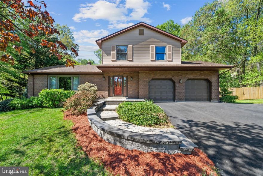 * OFFER DEADLINE 4/26 @ 9 PM* Welcome to 106 Black Oak Drive —a stunning home where timeless comfort meets serene natural surroundings just moments from Fairhill’s renowned 5,656-acres known for its rolling fields, wooded trails, and unspoiled beauty. Set on just under an acre of private, tree-lined property, this 4-bedroom, 2.5-bath home offers the perfect balance of indoor elegance and outdoor tranquility. A gracious foyer welcomes you into a thoughtfully designed main level featuring a circular flow ideal for both everyday living and effortless entertaining. The spacious living room is anchored by a cozy gas fireplace, beautifully framed by custom built-ins, while the formal dining room transitions seamlessly into the expanded, refreshed kitchen. Here, you’ll find granite countertops, abundant natural light, and picturesque views of the peaceful backyard, all opening to the inviting family room. From the family room, step into the screened-in porch—complete with a new tile floor—offering the perfect space to relax and unwind while enjoying the surrounding nature. Beyond, the expansive backyard creates a true private retreat, featuring multiple decks and a brand-new patio (2024), ideal for gatherings or quiet evenings outdoors. A main level laundry room, 2 car garage and powder room complete the main level.  Upstairs, the home continues to impress with four generously sized bedrooms and two beautifully updated full bathrooms. A dedicated second-floor air conditioning system ensures optimal comfort for restful summer nights. The partially finished basement adds valuable flexibility, perfect for a recreation room, home office, or gym, while the unfinished portion provides ample space for storage or a workshop and includes convenient exterior access. Recent updates enhance both style and peace of mind, including a new blacktop driveway (2024), front walkway hardscaping, re-decked outdoor spaces (2024), new carpet on the upper level (2024) and in the basement (2026). This is more than just a home—it’s a private retreat in a sought-after location, offering space, comfort, and a connection to nature that is truly rare. Conveniently located just outside the City of Newark and the University of Delaware!