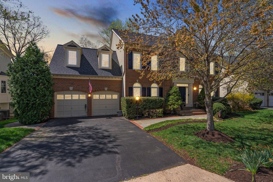 Timeless Luxury in Rivercrest – Where Elegance Meets Innovation
Welcome to an exceptional estate nestled on a 0.39-acre private lot backing to towering trees and a tranquil stream—a rare sanctuary in the prestigious Rivercrest community (20165). This refined, upgraded residence offers an unparalleled blend of classic craftsmanship and modern sophistication, appealing to buyers who demand excellence in both form and function.
Walk up the elegant brick sidewalk to step inside your dream home.  A stately two story entry greets you with a stunning chandelier hanging over the grand staircase and custom millwork.   The light-filled dining room with custom plantation shutters is spacious enough for the largest of dinner parties.  A butler’s pantry bridges the gap between everyday living and elegant entertaining,  Work from home? The main floor office allows for compete organization to keep you productive all day.  Need a break?  The attached formal living room provides a quiet space to relax and read.  
At the heart of the home, the chef’s gourmet kitchen is a showpiece—equipped with professional-grade stainless steel appliances, sleek quartz countertops, timeless white cabinets, and large island provide an abundance of prep space, while a custom-designed coffee bar adds a boutique-hotel flair to your mornings.  The adjoining sunroom floods the space with natural light and views of the surrounding woodlands, creating a seamless indoor-outdoor flow.   The kitchen also opens to the family room with its Magnolia-like style using built-in shelving and custom millwork giving it so much character and charm.  
Step outside to the expansive screened-in porch—a perfect setting for al fresco dining or quiet reflection, with unobstructed views of nature's beauty.  You can hear the stream in the background harmonizing with the melodic songs of the birds.  
The primary suite is nothing short of a private retreat, featuring a spacious sitting room, spa style bath, and serene wooded views. The considerably sized walk-in closet with well planned organizers is a dream. Down the hall, you’ll find three additional generously sized bedrooms, including one with custom built-ins—ideal for a study or flex space—and two more full bathrooms, one of which is ensuite for added comfort and privacy.  So many great add ons to these bedrooms make them anything but standard.  Beautiful hardwoods, built-ins and window treatments complete each space.
The fully finished, walk-out lower level is designed for entertaining at scale, with ample space for a game room, media lounge, or fitness studio. A wealth of custom storage solutions and organizational systems throughout the home ensures a clutter-free, elevated lifestyle. Walk outside to the flagstone patio or the dry deck overlooking the picturesque, large, usable back yard.  Sit and take in all of nature's beauty.
Almost every inch of this home has been meticulously updated with high-end finishes and thoughtful details. Brand-new dual-zone furnaces, fresh designer paint, and new plush carpet in the family and lower levels complement the expansive hardwood floors throughout both upper levels, setting the stage for a home that is as stylish as it is comfortable. Additional updates include an A/C unit, roof and all windows and doors.  Every detail has been considered, including exquisite millwork, a whole-home Google Smart System with integrated Sonos in nearly every room, and EV charging capability—ideal for the buyer who demands the best. 
This is more than a home—it’s a statement of refined living in one of Northern Virginia’s most sought-after neighborhoods. Opportunities like this are exceedingly rare.