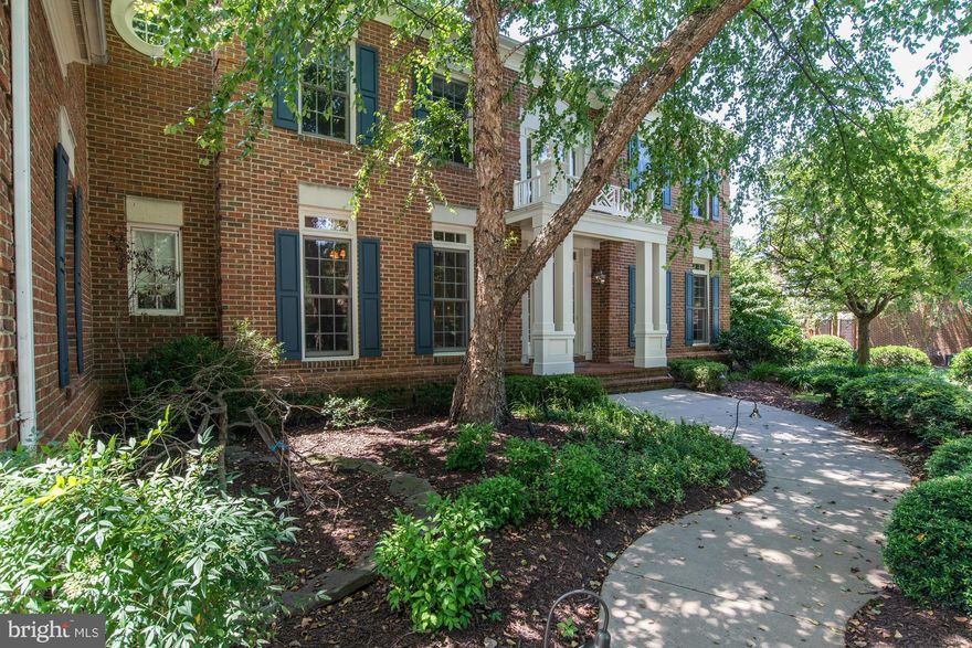 Beautifully decorated & upgraded w/ custom moldings, hardwoods, high ceilings: gourmet Kit open to the BFR & Sun room w/ vaulted ceiling & palladium window, FR with coffered ceiling & gas FPL, LIB w/built-ins & back staircase. MBR suite with Sit Rm, garden Bath & oversized w/in closet w/ organizers. Walk-up LL w/ Rec Rm, Exerc, Den & FBA. Magnificent level lot w/ heated pool, patio, deck & gazebo