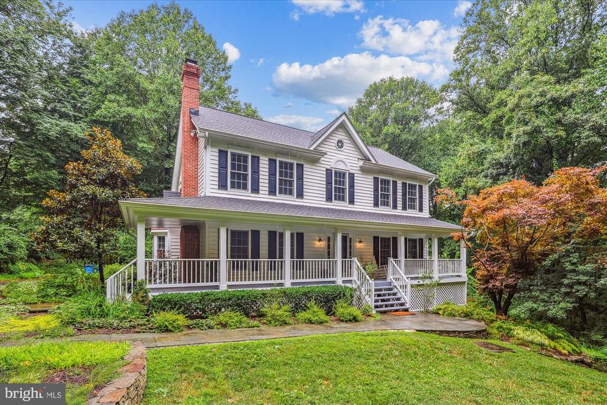 ? Long for that quiet wooded clearing or a private garden oasis of your own? ...one that offers both secluded privacy close to the conveniences of village living AND easy access to transportation: Dulles International, Routes 66, or 123, Metro and minutes to Vienna and on to the urban services of Tysons Corner.
Welcome to Lena Court in Oakton, Cul -de-sac neighborhood with easement driving lane through the woods to a traditional' FRONT PORCH- SWING (1995) farmhouse’ with contemporary interior spacial design on three levels, over-sized windows inviting the outdoors in, screened porch, covered terrace.   Light, bright and welcoming, this sunny household is perfect for entertaining and cozy alone time.  Just think… be at home for a few moments of ‘staycation’ every day!  Promising perfection and delivering!  Look through our camera icon to walk around floor plan (also measured floor plan) and check our location map… this is truly a unique and rarely available special quality builder’s own home- lovingly maintained and renovated, offered for the first time in decades.  Situated on 2.3+ acres this home currently is configured with a top floor Owners ensuite (fourth bedroom now opens to primary bedroom and closed to hall for an office, study, or serious dressing room). Bedroom level has two other bedrooms and a hall bath.  Dogleg stair down to main entry which is flanked by dining room and fireplaced living room as well as fronted by a full length covered entry porch.  Lower level has a bonus/guest room, possible in-home theater, hobby room or office, large partially finished storage space, grand Rec room opening to covered terrace and views of rolling lawn & wooded surround, plus one of the 3.5 fully renovated baths. The vibrant center of this home is a wonderfully renovated open kitchen flanked by a cathedral ceilinged family room & fully screened porch with open grilling deck behind (think Adirondacks) and sided by the mudroom, laundry and two car garage.  Special considerations built-in for easy living presented with Shaker like purity of purpose.  some of the images presented on floor plan are virtually staged for illustrative purposed and those furnishings shown are not included in sale, however some are actual and represent items to be conveyed with sale. i.e. kitchen table and counter chairs so see disclosures.