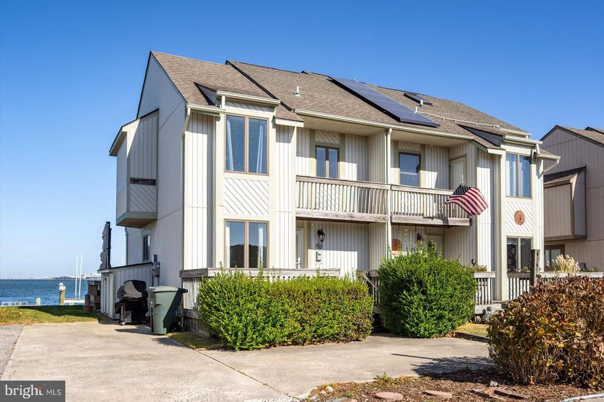 Discover your bayside retreat with this stunning waterfront gem! Located directly on the bay, this two-story residence offers stunning water views from your open living and dining areas, creating an inviting space to relax and unwind.  First floor offers a bonus room that could be used as a fourth bedroom/ office. Upstairs, the spacious primary suite features an ensuite bathroom and a private balcony overlooking the bay—ideal for enjoying your morning coffee. Two additional bedrooms upstairs provide ample space for guests. Outside, you can enjoy the expansive patio, perfect for hosting dinner or events. Huge new pier and lifts that can accommodate larger boats for offshore enthusiasts or plenty of dockage for multi smaller water sports. Nestled in a peaceful location, this home is also conveniently close to many of Ocean City's restaurants and attractions.