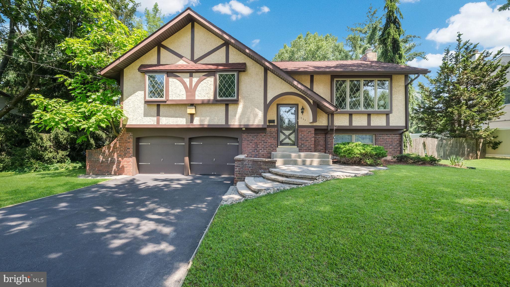 WOW! This is a MUST SEE! You can feel the pride of ownership in this charming bi-level home nestled in the highly desirable Palomino Farms neighborhood of Warrington. A beautifully manicured lawn, mature trees, and classic curb appeal greet you as you pull into the spacious two-car garage. The main level, you're welcomed by an expansive living room with a fireplace. You will also find a dedicated laundry room and a convenient half bathroom. Upstairs, natural light pours into the sun-soaked family room through three large windows, creating a bright and airy atmosphere. Sliding glass doors lead to a enormous deck—perfect for morning coffee or summer entertaining and nearby, the generously sized kitchen offers ample cabinet and countertop space. Three spacious bedrooms complete the upper level. The expansive primary suite includes a private ensuite bathroom with a stall shower, while the remaining two bedrooms share a stylishly updated hall bath. Step outside to your backyard sanctuary—a partially fenced yard with lush, mature trees providing both shade and privacy. There’s plenty of space to bring your outdoor dreams to life, whether that’s a garden, patio, or play area. Ideally located just minutes from shopping, dining, and major commuter routes, and situated within Central Bucks School District, Make this home yours today!! Showings start July 9th!