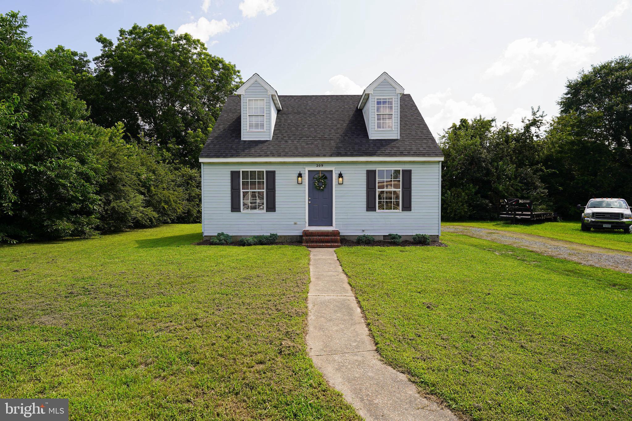 Welcome home to 209 West Main St in Fruitland —where small-town warmth meets thoughtful updates and everyday ease.
This efficient cape-cod style home has so much to offer, and is waiting for it's new owners to come and introduce themselves!
Undergoing major renovations and updates in 2019, the home features key improvements: newer HVAC, water heater, luxury vinyl plank flooring in kitchen and baths, plush carpeting throughout, and refreshed vanities and fixtures—all designed to support easy, low-maintenance living.
Inside, you'll find a cozy main level with living room, dining room, kitchen, and a first-floor bedroom. The kitchen includes white cabinetry, granite countertops, stainless steel appliances, and a backyard view that feels just right when you're washing up after dinner. Enjoy dual-access to the rear deck, from a sliding glass door in the dining area, or access door from the kitchen, it's never been easier to incorporate your outdoor living space into your everyday routines, whether it's grilling or entertaining, utilizing your backyard has never been more convenient!
Upstairs offers two additional bedrooms bathed in natural light and a full bath with a fiberglass tub/shower combo. Laundry’s tucked into the closet of the second bedroom—a small detail that makes a big difference in everyday function.
And location? You’re right in the heart of Fruitland, a Shore Pick of a town known for its big-hearted spirit and easy access to amenities. You’re minutes driving distance from top-rated schools, shopping, dining, and healthcare—and less than an hour’s drive to the beaches of Maryland, Delaware, and Chincoteague VA.
Come on out and say hello, and take a walk through! This home speaks for itself—in layout, in updates, and in the way it feels when you walk through the door. Schedule your private tour today and see why this one’s worth a visit.