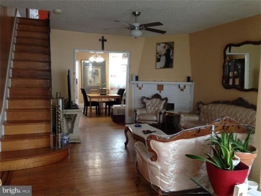 BACK on the Market! Buyer's mortgage fell through. Beautiful and spacious 3 bedroom 2 bath home in the Oxford Circle section of Philadelphia conveniently located close to public transportation, shopping and schools. Outside the home has a large cemented patio for you and your guests to enjoy. Inside boasts beautiful hardwood floors through out, a large dining room, newer windows, an eat in kitchen has been updated with new counter tops, cabinets, and stainless steel appliances. The basement is finished with a newly renovated full bath and a garage. The 3 bedrooms are decent sized with ample closet space. There also is a brand new composite deck with privacy fence for summer BBQ.  Motivated to sell! There is 5,500 in grant money available for first time home buyers contact me today to see if you qualify.