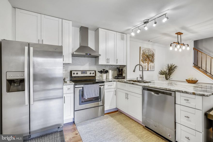 This meticulously maintained home is listed to find it's new owner nearly overnight! Boasting some of the best property features found in the neighborhood. Plenty of natural light flows throughout the entire home captivating the stunning hardwood floors on the main level along with the fireplace. Upgraded kitchen with granite countertops, Stainless Steel Appliances, beautiful backsplash, and new fixtures. Very private and beautiful front patio, perfect for entertaining guests at a summer cookout. If you're seeking to find the perfect home in a quiet neighborhood in the heart of Columbia just minutes from Howard Community College, and Columbia Mall, then this home is calling your name!