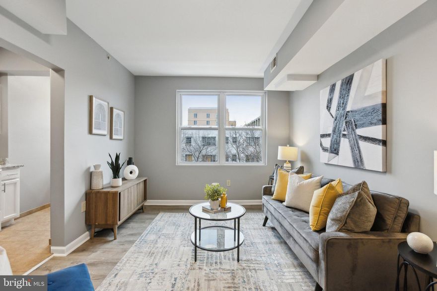 LOCATION, LOCATION, LOCATION, and a lot of natural light. This well planned and spacious 1 bedroom condo is a block from Columbia Heights metro stop, 2 blocks from the bus lines on 16 street, and 4 blocks to the historic Meridian Hill park. With brand new flooring, brand new doorknobs, brand new light fixtures, and fully just painted it is move-in ready and good to go. As you enter the unit and the foyer, to your right is a spacious coat closet and to your left is a bright full kitchen. Ahead of you is the bright and spacious living room and dining room combo. You can set your furniture in several ways and have many options for your set up. Then continue to the bathroom which is just next to the bedroom. You have a relatively large tub and again a frosted window that brings a ton of natural light in for you to get ready in the mornings, or to relax in the tub in the afternoon. To your right is another closet and then to your left is a large and bright bedroom with its own closet. In the pictures you see a queen bed with two large bedside tables, and that should give you assurance that you can easily put a king bed there and still have room for your desk and dresser. This beauty won't stay on the market for too long.