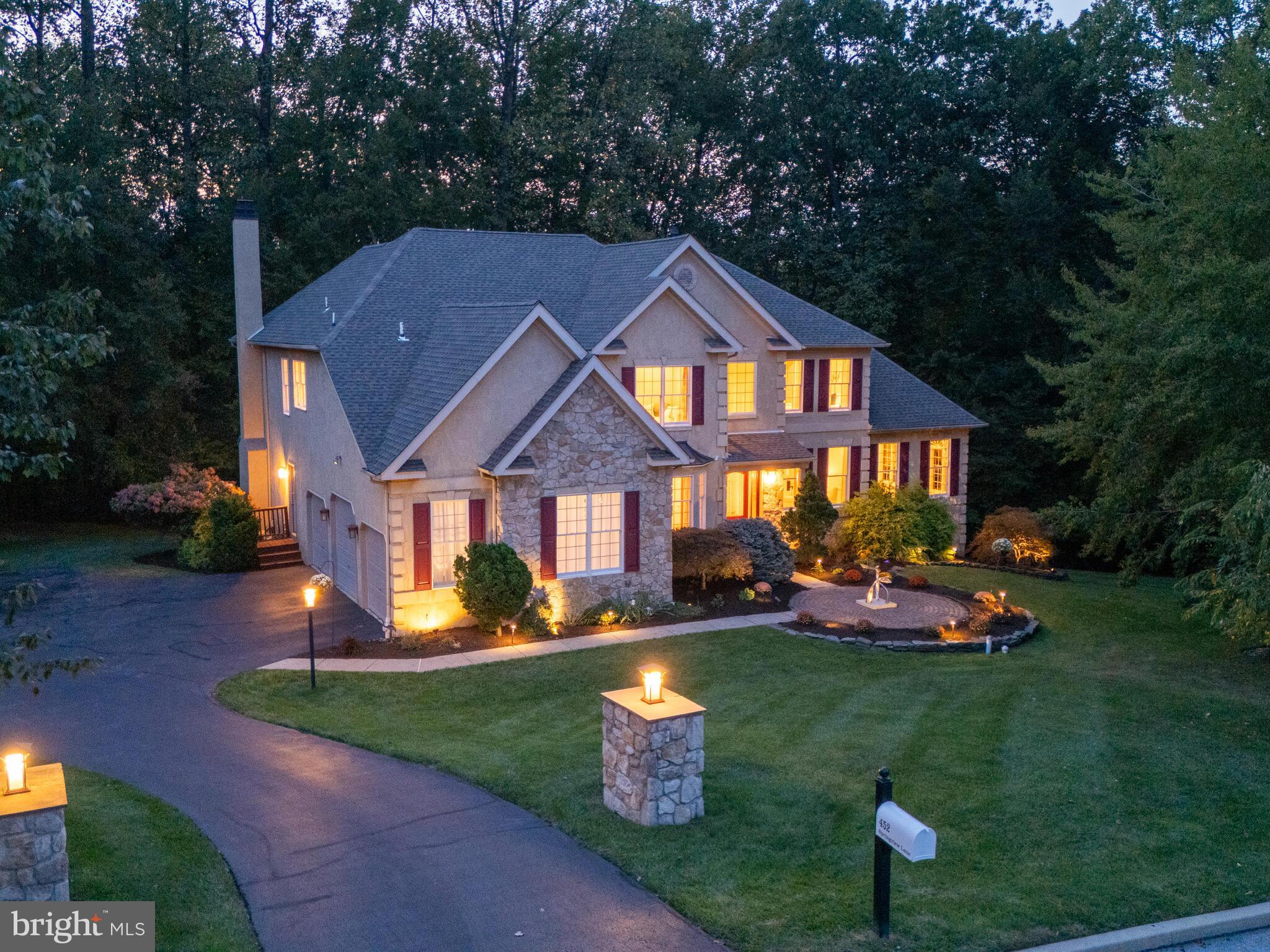 Open house Saturday 10/4, 12-2pm & Sunday 10/5, 1-3pm. Welcome to 452 Springview Lane in the Valley Forge Woods neighborhood. A spacious open floor plan home with soaring ceilings, 4-bedrooms, 4.5-baths, a finished walkout, daylight basement and a private back yard backing up to woods. This home has been consistently upgraded w/ significant investments over the years. The dramatic foyer & front staircase welcome you & your guests into the home. To the left is a good size office with built in bookcases & oversized custom built desk with large windows offering views to the front yard. To the right is the living room & then moving through the living room to the large conservatory that offers three walls of windows that look out to the private, wooded side yard….and French doors that open to the back deck. This conservatory enjoys its own heating and air conditioning system & can be used as a game room, a playroom, a music room, etc. Stepping from the conservatory back into the living room area is adjacent to the dining room. The kitchen, sunroom & family room are towards the back of the house, & all this space enjoys walls of windows that feature views of the private wooded back yard. The kitchen is spacious with plenty of cabinet space, counter space, a large island, updated appliances (downdraft gas cooktop (2025, $3,000), GE Monogram double convection oven (2018, $2,700), GE Café refrigerator (2020, $3,300), & newer dishwasher (2020)) and plenty of room to accommodate a large table and chairs. The sunroom offers another room, part of the kitchen area, with skylights and with a french door out to the large back deck. This is a great “flex space” for entertaining, & daily life. The large family room flows right from the kitchen and features a two-story wall of windows with lots of natural light, a floor to ceiling stone faced gas fireplace & a second staircase to the upper level. The half bath & laundry room complete the main level. Upstairs, the primary suite offers a retreat with updated spa-like features. A sitting area, a large walk-in closet, a large bathroom w/ a glass enclosed double spa shower with oversized rain shower head and wall jets, a large whirlpool soaking tub & a separate water closet. Bedrooms 2 & 3 share a bathroom with 2 sinks. Bedroom 4 enjoys an ensuite bathroom. The fully finished basement (2009, $75,000) offers a third level of living space w/ an open floor plan with lots of sunlight from 3 windows plus french doors opening to the back yard. It features a full bath, a wet bar with an additional refrigerator, a theatre room, & lots of additional space for exercise, play & multiple storage areas. There is also a full house generator, 3 car garage, and beautiful landscaping in the front yard with dramatic landscape lighting. Other major improvements include stucco remediation w/ 2 window replacement and new shutters (2025, $30,000), a new heating & A/C system on the second floor w/ smart thermostats throughout (2024, $16,400), & a new roof w/ skylights & copper roofing over the office window (2021, $38,000), new carpet throughout much of the home (2021), and fresh paint in several rooms (2025). This home is part of a vibrant community that offers access to parks, walking trails, making it perfect for those seeking an active lifestyle. Enjoy the best of both worlds – a tranquil suburban setting, located just 10 mins to the Paoli Train which will take you north to D.C. & East to Phila & then straight to NYC. Just 10 minutes to downtown Phoenixville (voted #1 Best Small Town to live in America by Travel + Leisure magazine in 2025) and with great public schools. Across from the Phoenixville Country Club, 5 mins to the Phoenixville YMCA, surrounded by parks & hiking trails, Valley Forge National Park is 3 mi, and KOP Mall 7 mi. This home combines comfort, luxury, and long-term value w/ its long list of upgrades, beautiful design, & prime location in Valley Forge Woods. Welcome home!...