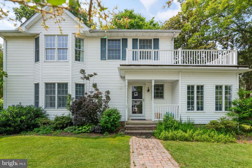 Discover the perfect blend of comfort and coastal charm in this captivating 3-bedroom, 2.5-bath Colonial nestled on a fenced corner lot in the heart of Oxford. From its classic architecture to the inviting indoor and outdoor living spaces, this home is an ideal retreat for year-round living or a weekend escape.

Step into the welcoming foyer, where you'll be greeted by spacious living and dining areas adorned with beautiful hardwood floors, perfect for everyday relaxation or entertaining guests. The modern kitchen is ready for your culinary creativity, offering a functional and stylish space for cooking and gathering.

A sun-drenched tiled sunroom offers serene views of the yard and surrounding neighborhood—an ideal spot for morning coffee or a quiet read. Adjacent to the sunroom is a tiled laundry/mudroom, equipped with a washer/dryer and convenient half bath.

Upstairs, the primary suite provides a peaceful retreat, featuring a luxurious tiled bathroom with double sinks and a walk-in shower. Two additional bedrooms share a generous full hall bath with double sinks and a tub/shower combo—ideal for family or guests. New luxury vinyl flooring throughout the upstairs halls and bedrooms adds a fresh, modern touch.

Step outside to enjoy expansive second-floor views of lush trees, passing boats, and scenic Town Creek from the impressive 23x19 wrap-around deck—a perfect spot to unwind and soak in the surroundings.

The fully fenced yard offers a safe haven for pets and children to play, while the patio and deck make entertaining outdoors a breeze. A spacious garden shed provides ample storage for bikes, tools, outdoor furniture, or water gear.

Located just moments from Town Creek and Campbell’s Boatyard, this home offers easy access to boating and water activities. Downtown Oxford is just a short stroll away, with shops, restaurants, and waterfront charm at your fingertips.