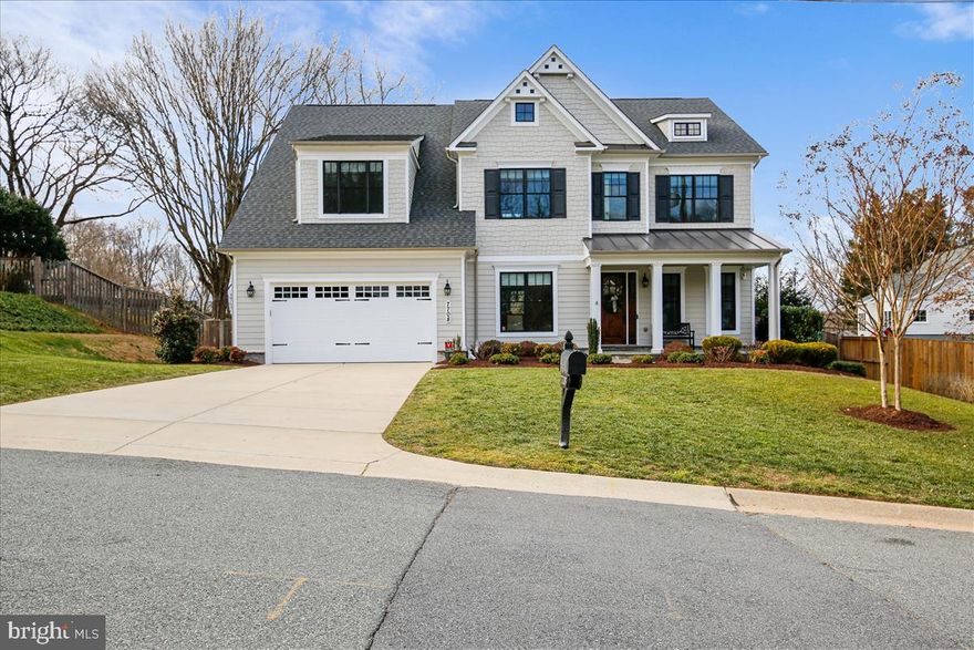 This fabulous Arts & Crafts Colonial in sought-after Cohasset subdivision features 5 bedrooms, 6 full baths and over 7,000 finished square feet. Extraordinary workmanship that features a gourmet kitchen adjacent to a sun-filled morning/breakfast room, a HUGE family room with gas fireplace, banquet-sized dining room with butler’s pantry, living room, mudroom, office (that can be converted to a bedroom) and full bath all on the 1st floor. The 2nd floor boast an amazing owner’s suite with his & hers walk-in closets, coffee bar and the gorgeous Master Suite Spa Bath with soaking tub, separate shower and double vanities. Additional 3 bedrooms with ensuite baths, laundry room with tons of cabinet space and the 2nd floor family lounge area is sure to be used time & time again. The finished lower level includes a guest bedroom with full bath, exercise room, expansive rec room with dry bar and a children's built-in playhouse, storage room and walk-up to the backyard. The splendid high-end finishes and attached 2-car garage in addition to a deck and rear covered porch. In Walt Whitman High School District.
