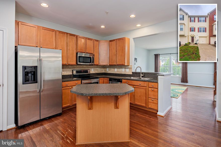 Welcome to this beautifully maintained townhome, offering a perfect blend of comfort and style. This home features three spacious bedrooms and two full bathrooms, including a master suite with a private ensuite bathroom, all located on the upper level for added privacy. The main level boasts an open-concept living area, perfect for entertaining, with seamless flow between the living room, dining area, and kitchen. Enjoy the peaceful view from the large deck, which overlooks a tranquil wooded area, providing a serene backdrop for your outdoor gatherings. The lower level offers a versatile recreation room, ideal for a home office, gym, or media room, along with a convenient half bath. With driveway and garage parking, this home meets all your practical needs while providing a retreat-like atmosphere. Don’t miss this opportunity to own a townhome that combines modern living with a peaceful setting.  The house has just been freshly painted and is ready for you to move right in! The amenity-rich community of Tanyard Springs has over 110 Acres of Common Area, a large Community Pool, two Tennis Courts, a Clubhouse, a Basketball Court, a 24-hour fitness Center, three Dog Parks, 47 pet stations throughout the community, four Playground Areas, a Play Field, two Pavilions, and Community Garden Garden Plots! ***AACPS REDISTRICTING HAS BEEN APPROVED FOR ES (SOLLEY), MIDDLE (NORTHEAST), and HIGH SCHOOL (NORTHEAST)***