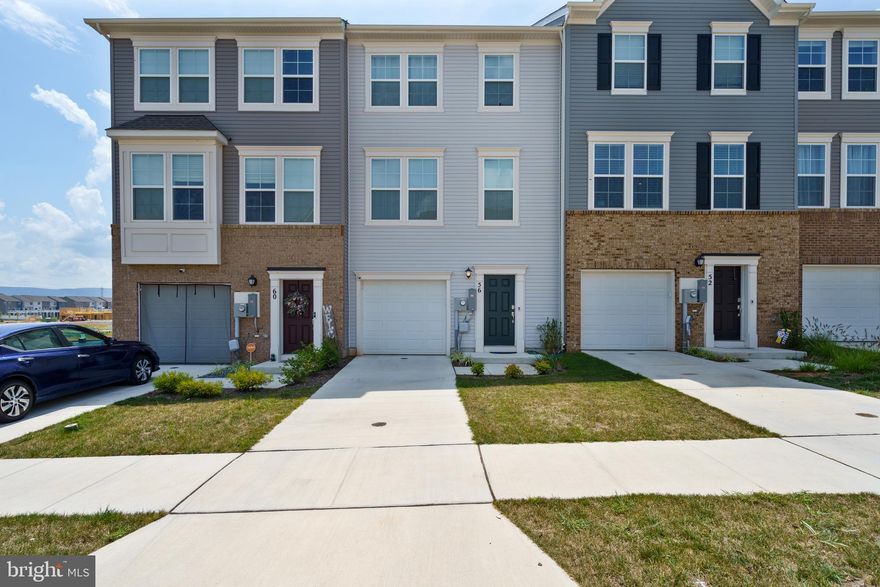 Step inside and view this beautiful, well kept townhome in the highly sought after community Norborne Glebe. Fully finished lower level, LVP on the main level along with granite countertops in the kitchen with stainless steel appliances. Mountain view from the deck that sits off the kitchen. Top level has 3 bedrooms and laundry room for convenience. Come view this home today