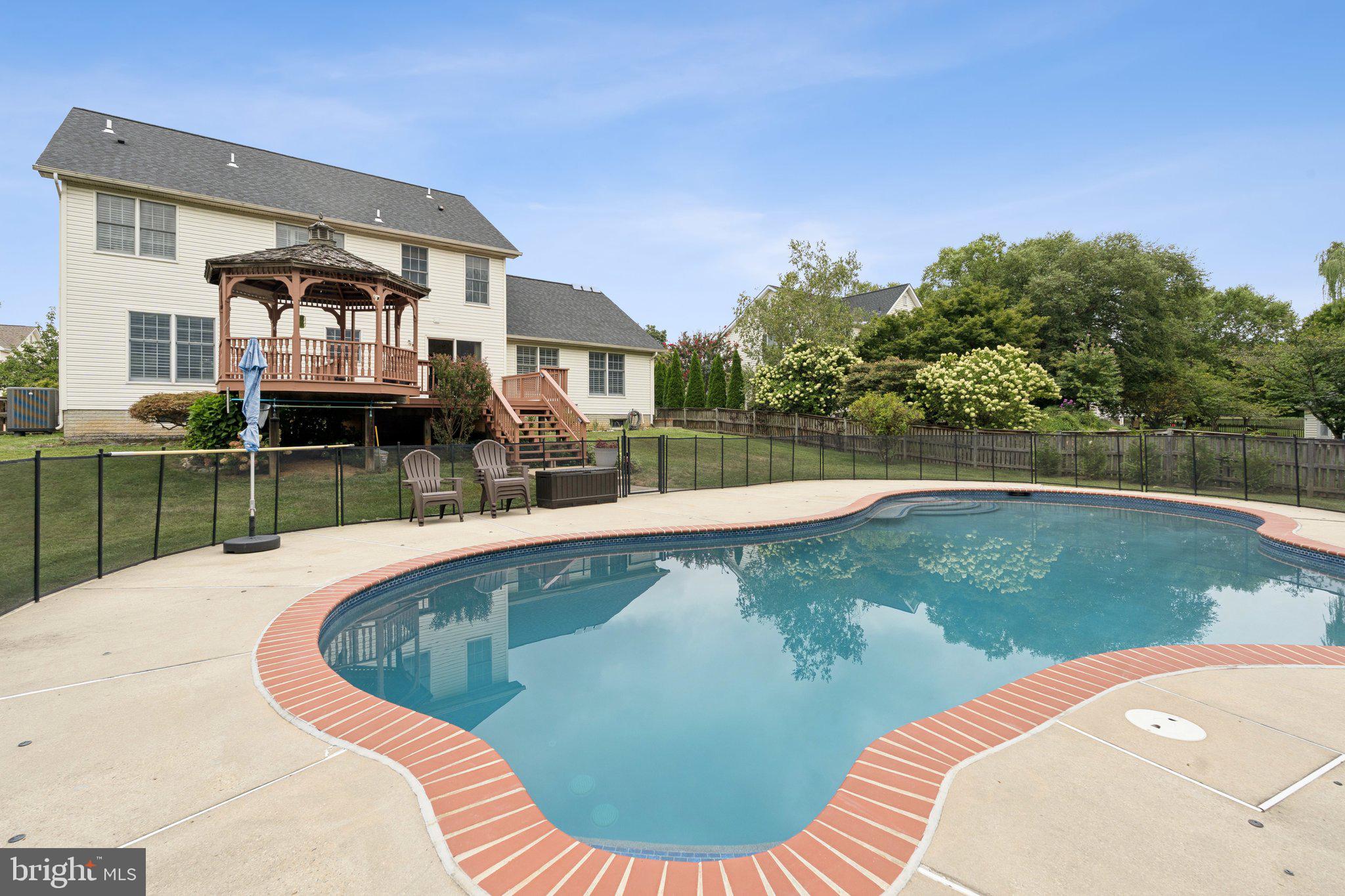 Don't miss out on the opportunity to own one of the largest lots in the community. With a heated pool and a well-maintained parcel, this is an unbeatable price. This beautifully appointed 4-bedroom, 3.5-bath home in the sought after Foxfield neighborhood features an open-concept layout, spacious living areas, and a stunning backyard oasis, this home is ready for its new owner. Relax in the privacy of your spacious backyard and private oasis. With plenty of room for entertaining and everyday living, this home combines comfort and style in one exceptional package.