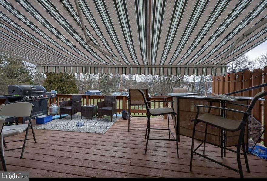 Some laminate floorboards separated & require attention; deck off dining area with large rear lot; finished walk-out basement; newer 50 gal. water heater; new roof approx. 2019; ceiling fans & overhead lights in all BR's; laundry in bsmt.; newer microwave; washer/dryer/frig./2 A/C units included (as-is, no warranty); large wall mounted TV included (works fine, no warranty); great starter home in need of some TLC.