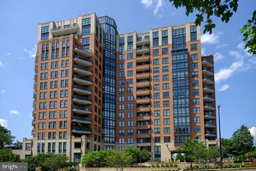 ***STUNNING  Penthouse in the highly sought-after Paramount Condominium! In Reston Town Center! Urban lifestyle living at its finest**
Fantastic  2540 SQFT of luxury living with oversized windows that boast beautiful views from every room!! Can you imagine the  termendous sunsets and incredible nighttime twinkling skies?  This sun filled unit has wide open living/dining space. 3 spacious bedrooms, 3.5 updated bathrooms plus a den/office/library with a gas fireplace.  Lovely chefs kitchen with large breakfast area and  fabulous views for miles. Beautiful Italian Porcelain tile flooring in living, dining rooms and kitchen. This is a  MUST SEE  true penthouse that has TWO private balconies!!! Plus 10' ceilings throught out this very spacious Penthouse!  The Paramount condo has nice amenities which include two exercise rooms, one for aerobic training and one for strengthening.  Lovely swimmming pool, great patio off pool area for your entertaining. Excellent club/party room which leads to the patio for outdoor entertaining. Enjoy the walkable lifestyle with the many new restaurants, must-have shops, the new Look Cinema  and year round entertainment  Walk to the Reston Town Center Metro  or take the Links Shuttle Bus. The Paramount Condo is not only known for their best in Management.  Fee includes all the amenities-gorgeous pool with perfect ambiance, two fitness centers,  one areobic and one strenghting  room, party room, with beautiful patio, guest suite, concierge and security, not to mention snow and trash removal, gas, water,  sewer,  two garage parking  spaces is also included.  Penthouse has 2 deeded garage parking spots + large storage space. Don’t miss out on this ONE-OF-A KIND living that is a perfect combo of Luxury & Charm in the lively Reston Town Center. Come enjoy all the new restaurants and the new Look cinema that have opened recently!
And do not miss out on living with beautiful views of the Blue Ridge Mountains from one balcony and the gorgeous view of Sugarloaf Mountain in Maryland from the other balcony!!
Home has been virtually staged.