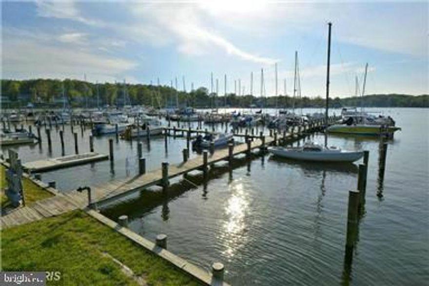 REDUCED!! Opportunity knocks in Bay Ridge! Charming 3 BR, 1.5 BA, 2 lev Contemporary across from $1M+ waterfront homes. Upper lev Great Rm & Kitchen w/ FPLC & vaulted ceilings.  Lg deck overlooks 1/4 acre level lot with lots of potential to renovate existing property or build your dream home. New HVAC/2017. Voluntary HOA with community marina, sandy beaches, pool and kayak storage. SOLD AS IS.