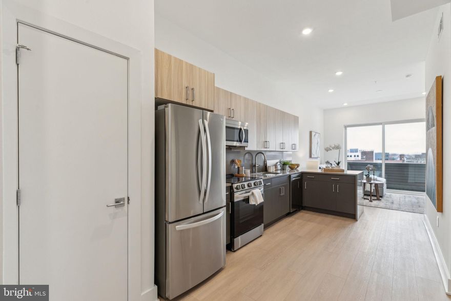 Available Now | Leasing Special: Only 1st month and 1-month security deposit are due prior to move in. Advertised price reflects 15-month leases only - Tenant to receive a credit upon move-in to use how they choose during the lease term. Gross Rent is $2,261/month. 

Enjoy modern urban living with premium amenities at The Atrium! Each unit features a spacious and bright open floor plan with modern finishes and a sleek kitchen with energy-efficient stainless steel appliances. Unit #207 is a 2 Bed, 2 Bath unit located on the 2nd floor of the building. Enjoy central A/C and the convenience of in-unit ThinQ washers and dryers for easy laundry days. Be walking distance to Grocery Outlet, Monarch Yoga, Shissler Rec Center, and Bamn Fitness. Nearby Towey Playground and Hancock Playground. Check out neighborhood hotspots like Stateside Vodka, Fermentery Form, Four Humours, Goldie, Kalaya, LMNO, and countless more! Please note: photos and video tours may be of a similar unit within the building; exact layouts & finishes may vary.

The Atrium Amenities & Building Features:
Secure garage parking with 18 spaces. 
Butterfly Security System with personalized codes for deliveries. 
Furnished lobby with a stylish, welcoming atmosphere. 
Fully equipped gym featuring Star Trac equipment. 
Lounge area complete with two study rooms and a bathroom. 
Patio with enclosed pet run for your furry companions.  
Bike room and individual storage cages in the basement. 
Rooftop deck offering 360-degree views of the city (to be furnished in spring). 
Elevator and stair access to the roof deck. 

Lease Terms:

Generally, 1st month, 12th month, and 1 month security deposit due at, or prior to, lease signing. Other terms may be required by Landlord. $55 application fee per applicant. Pets are conditional on owner's approval and may require an additional fee, if accepted. (Generally, $500/dog and $250/cat). Tenants responsible for: electricity, cable/internet, a flat monthly water fee ($40 for 1BD & $60 for 2BD), and a $35/month amenity fee which is required and includes access to roof, lounge, outdoor area, and free building wide Xfinity wifi (including in-unit). Off-street parking is available for an additional fee: $200/month for uncovered spots and $250/month for covered spots. Landlord Requirements: Applicants to make 3x the monthly rent in verifiable net income, credit history to be considered (i.e. no active collections), no evictions within the past 4 years, and must have a verifiable rental history with on-time rental payments. Exceptions to this criteria may exist under the law and will be considered.