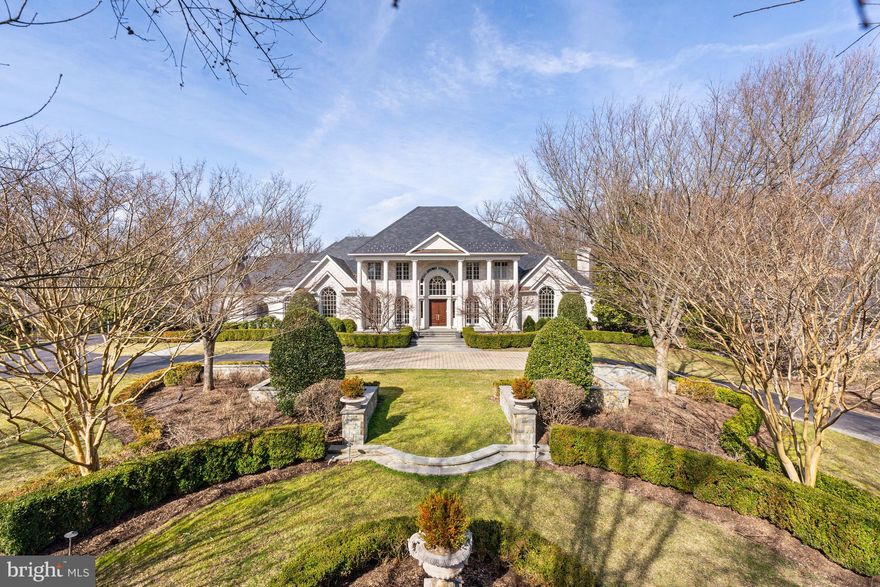 Everything you can imagine and more has been done to this home to please even the most discerning buyer. Custom-built to the highest standards, the interior has undergone extensive renovations and changes in the last two years to create an open floor plan for today’s more informal lifestyle. 

The exterior is a perfect introduction to the meticulous attention to detail that you will find inside. Extensive landscaping with mature hedges and trees as well as special lighting features throughout the two acres provide a wonderful backdrop for the circular driveway with four-car, side-entry heated  garage.  
The  dramatic two-story foyer with curved staircase with custom-designed railing, balcony overlook and a beautifully designed Niermann Weeks chandelier. Light streams in from multiple sets of oversized French doors. An additional set of three French doors, one of which leads  to a three- sided, covered loggia with wood-burning fireplace. This is a perfect place to enjoy views of the private backyard with swimming pool, pavilion, and multiple patios.  

A traditional living room and dining and dining room and adjacent butler’s pantry provide the perfect space for more formal entertaining.  

Major renovations have transformed the back of the house, which also overlooks the backyard, into an open, informal area combining a wonderful kitchen with a large center island, informal curved eating space, and family room. The kitchen has new white lacquered cabinets with thick marble countertops and custom backsplash,  and Wolf and Subzero appliances. A  huge marble island provides more counter space and storage as well as space for stools. The adjacent  curved breakfast area  opens  to the family room with its wood burning fireplace and a large screen TV niche above. Beautifully crafted built-ins with cabinets below and open glass display  shelves add extra storage space.  

Also on the first floor is a completely paneled cherry  library with matching built-in cabinetry and wood-burning fireplace. The adjacent lounge is a quiet place to kick back and relax. The new wet bar has a large wine cooler and two beverage refrigerators. This area could also be used as a first-floor billiards room.  Completing this level are two powder rooms, large laundry room and walk-in pantry.  

The upper level features four bedrooms, each with its own ensuite bathroom. The large Primary Bedroom was thoughtfully configured with curved  alcove with wonderful  views of the spectacular backyard and pool as well as a  private deck also overlooking the backyard. Loads of built-ins and closet space, a coffee bar and computer area make this Primary Bedroom special. The Ensuite marble  bathroom features  heated floors, an oversized shower with multiple shower heads, aerated free standing oval tub, two vanities with mirrors and sconces above. The guest room features a built-in bed with drawers below,  an upholstered headboard and matching built-in nightstands. The additional two bedrooms as well as the guest bedroom have outstanding marble bathrooms.  Great additional space can be found in the lower level. The large gym has excellent space for a variety of machines, a mirrored wall with two inset televisions, and a glass wall overlooking the recreation room. There is plenty of additional space for the current billiards area, recreation room, and a large room with arched entries for a future climate-controlled wine room. The home theater is state-of-the-art” with stadium seating and elevated platform with a huge screen. An additional wet bar is ideal for serving refreshments. Finally, the lower level also offers two bedrooms with two ensuite  full bathrooms, powder room and large storage space . 

Additional special features- include an elevator to all three levels with iron gate, multiple fireplaces, a combination of marble and white oak flooring, solid core doors throughout, and magnificent custom woodwork.